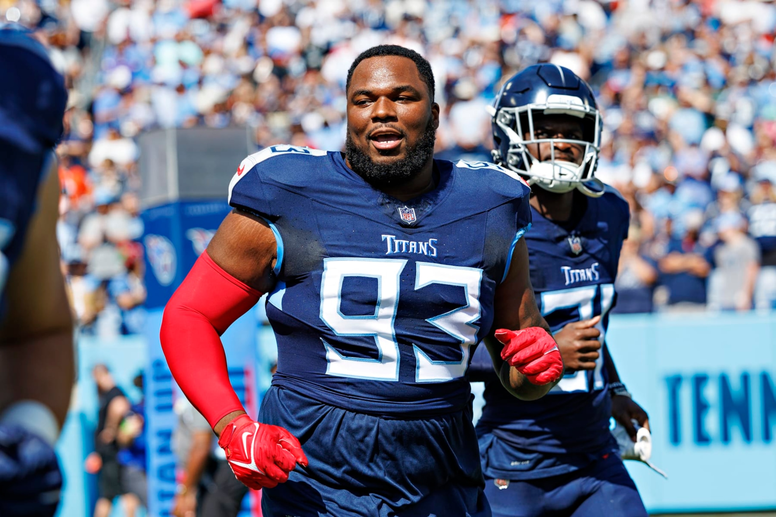 NASHVILLE, TENNESSEE - OCTOBER 1: Teair Tart #93 of the Tennessee Titans runs onto the field before the game against the Cincinnati Bengals at Nissan Stadium on October 1, 2023 in Nashville, Tennessee. The Titans defeated the Bengals 27-3. (Photo by Wesley Hitt/Getty Images) NASHVILLE, TENNESSEE - OCTOBER 1: Teair Tart #93 of the Tennessee Titans runs onto the field before the game against the Cincinnati Bengals at Nissan Stadium on October 1, 2023 in Nashville, Tennessee. The Titans defeated the Bengals 27-3. (Photo by Wesley Hitt/Getty Images)