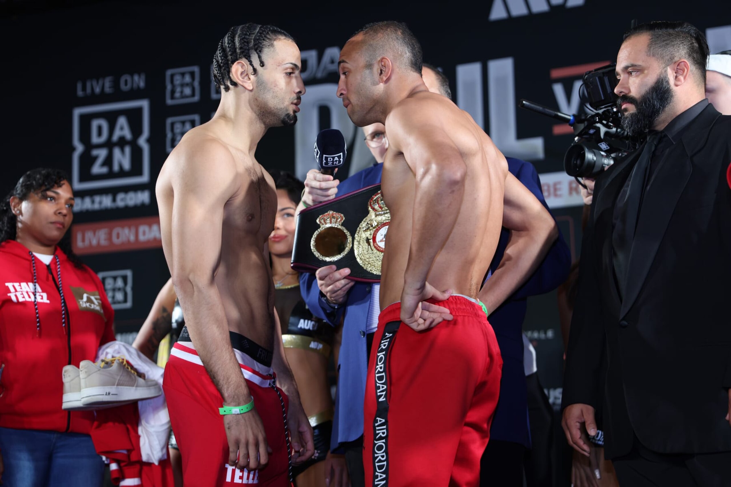 ORLANDO, FL - DECEMBER 14: Yoenis Tellez (L) faces off with Livan Navarro during the Jake Paul v Andre August - Weigh-in at the Caribe Royale Orlando on December 14, 2023 in Orlando, Florida. (Photo by Alex Menendez/Getty Images)