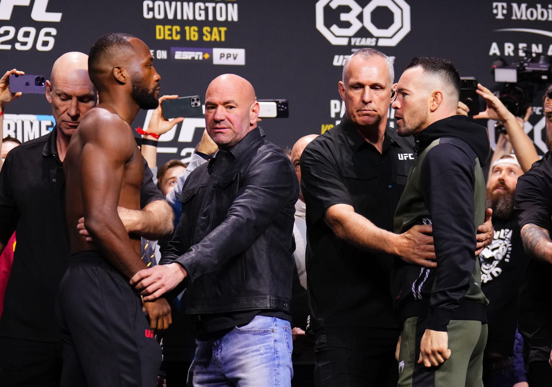 Leon Edwards and Colby Covington face off at the UFC 296 weigh-in. 