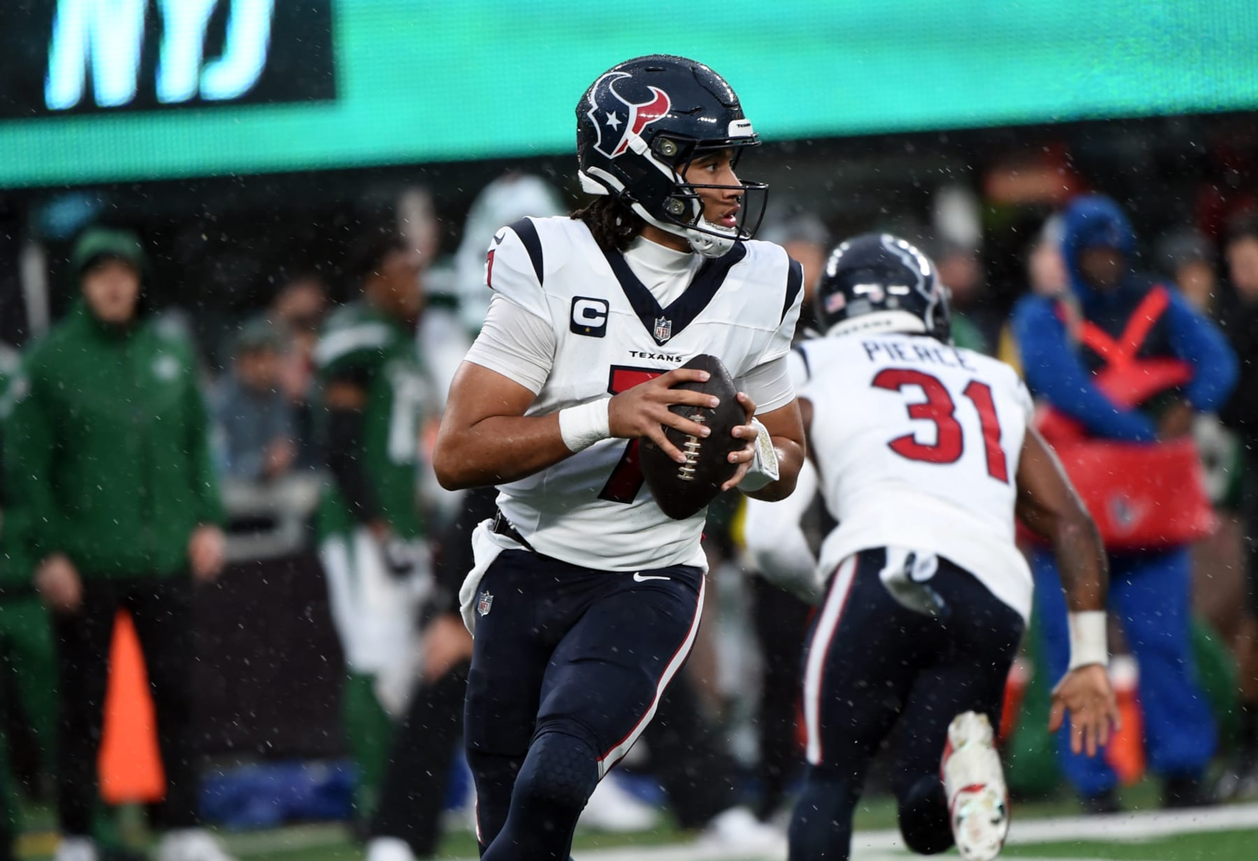 EAST RUTHERFORD, NJ - DECEMBER 10: Houston Texans QB C. J. Stroud looks for an open man during game featuring the Houston Texans and the New York Jets on December 10, 2023 at MetLife Stadium in East Rutherford, NJ. (Photo by John Rivera/Icon Sportswire via Getty Images)