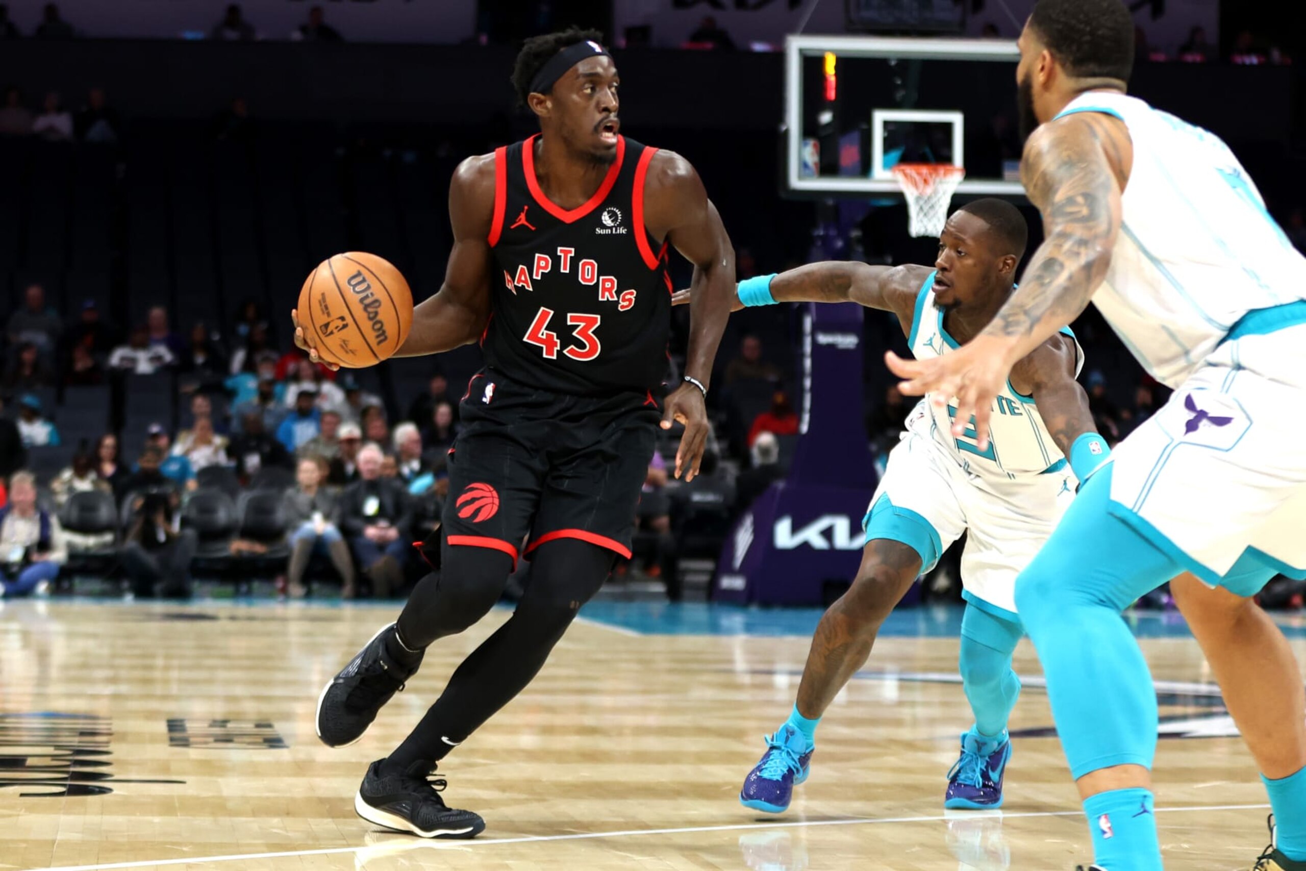 CHARLOTTE, NORTH CAROLINA - DECEMBER 08: Pascal Siakam #43 of the Toronto Raptors drives to the basket during the first half of an NBA game against the Charlotte Hornets at Spectrum Center on December 08, 2023 in Charlotte, North Carolina. NOTE TO USER: User expressly acknowledges and agrees that, by downloading and or using this photograph, User is consenting to the terms and conditions of the Getty Images License Agreement. (Photo by David Jensen/Getty Images)