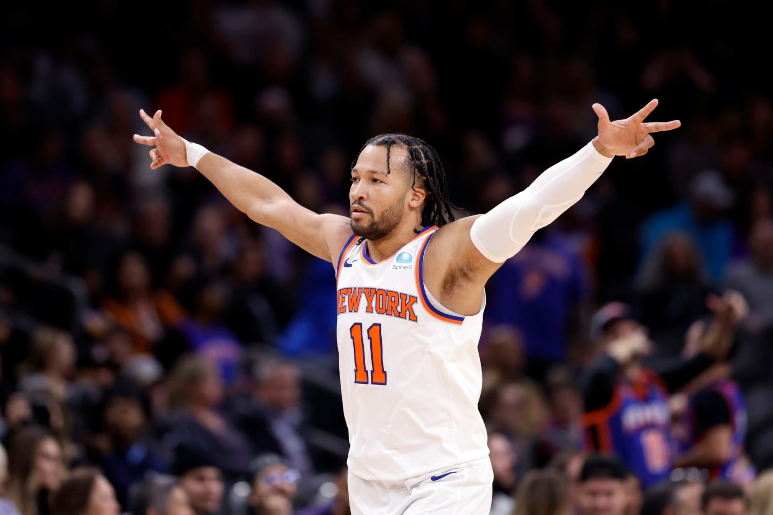 PHOENIX, ARIZONA - DECEMBER 15: Jalen Brunson #11 of the New York Knicks reacts after hitting a three point basket during the second half against the Phoenix Suns at Footprint Center on December 15, 2023 in Phoenix, Arizona. NOTE TO USER: User expressly acknowledges and agrees that, by downloading and or using this photograph, User is consenting to the terms and conditions of the Getty Images License Agreement.  (Photo by Chris Coduto/Getty Images)