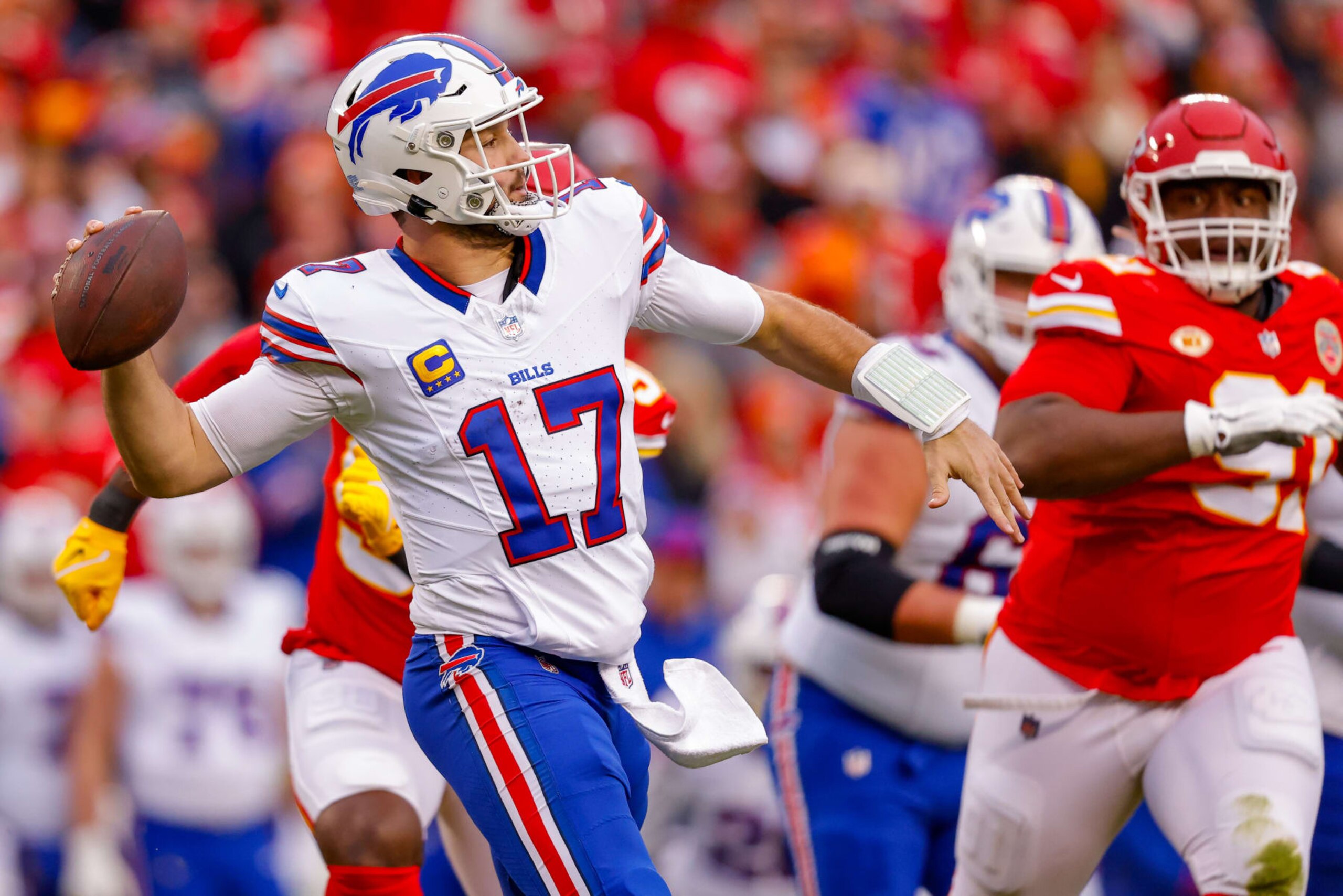 KANSAS CITY, MISSOURI - DECEMBER 10: Josh Allen #17 of the Buffalo Bills throws a pass against the Kansas City Chiefs during the first quarter at GEHA Field at Arrowhead Stadium on December 10, 2023 in Kansas City, Missouri. (Photo by David Eulitt/Getty Images)