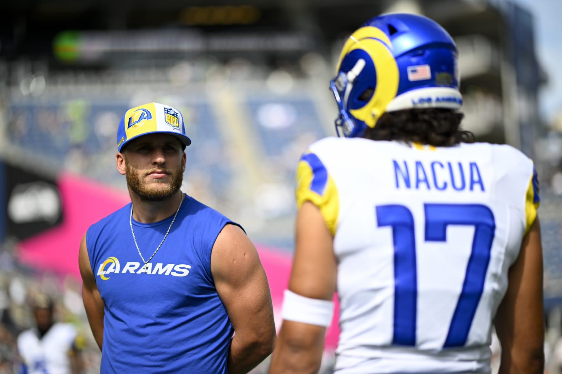 SEATTLE, WASHINGTON - SEPTEMBER 10: Cooper Kupp #10 of the Los Angeles Rams and Puka Nacua #17 meet before the game against the Seattle Seahawks at Lumen Field on September 10, 2023 in Seattle, Washington. The Los Angeles Rams won 30-13. (Photo by Alika Jenner/Getty Images)