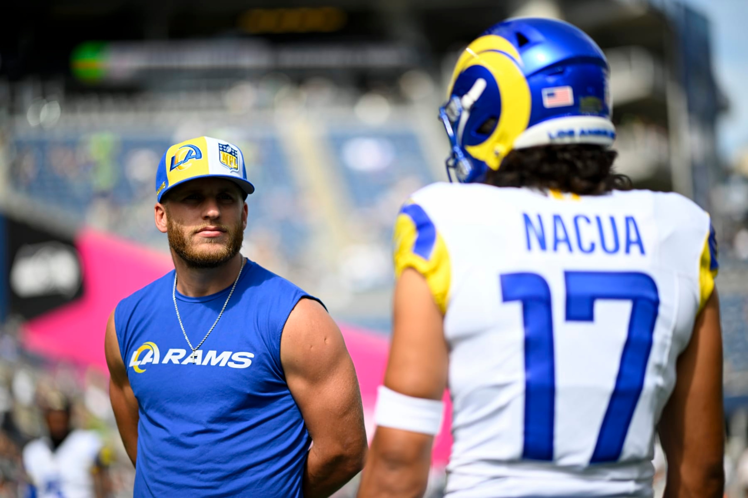 SEATTLE, WASHINGTON - SEPTEMBER 10: Cooper Kupp #10 of the Los Angeles Rams and Puka Nacua #17 meet before the game against the Seattle Seahawks at Lumen Field on September 10, 2023 in Seattle, Washington. The Los Angeles Rams won 30-13. (Photo by Alika Jenner/Getty Images) SEATTLE, WASHINGTON - SEPTEMBER 10: Cooper Kupp #10 of the Los Angeles Rams and Puka Nacua #17 meet before the game against the Seattle Seahawks at Lumen Field on September 10, 2023 in Seattle, Washington. The Los Angeles Rams won 30-13. (Photo by Alika Jenner/Getty Images)