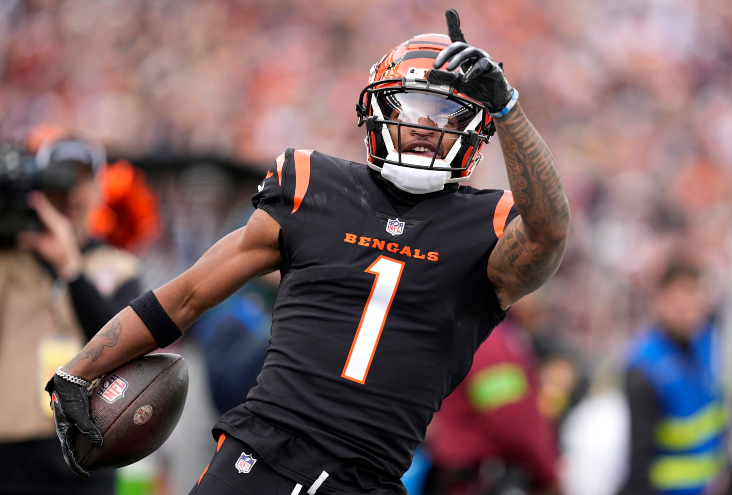 CINCINNATI, OHIO - DECEMBER 16: Ja’Marr Chase #1 of the Cincinnati Bengals reacts after making a reception in the first quarter of the game against the Minnesota Vikings at Paycor Stadium on December 16, 2023 in Cincinnati, Ohio. (Photo by Jeff Dean/Getty Images)