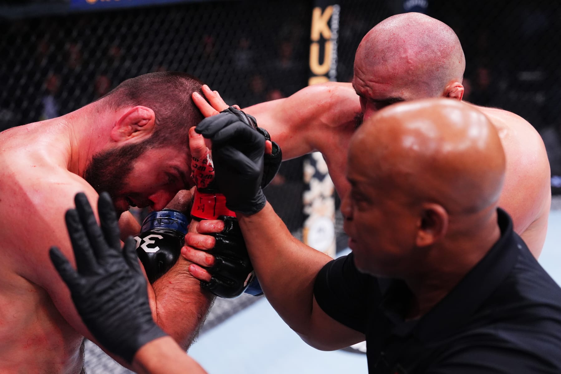 LAS VEGAS, NEVADA - DECEMBER 16: (R-L) Shamil Gaziev of Russia punches Martin Buday of Slovakia in a heavyweight fight during the UFC 296 event at T-Mobile Arena on December 16, 2023 in Las Vegas, Nevada. (Photo by Jeff Bottari/Zuffa LLC via Getty Images)