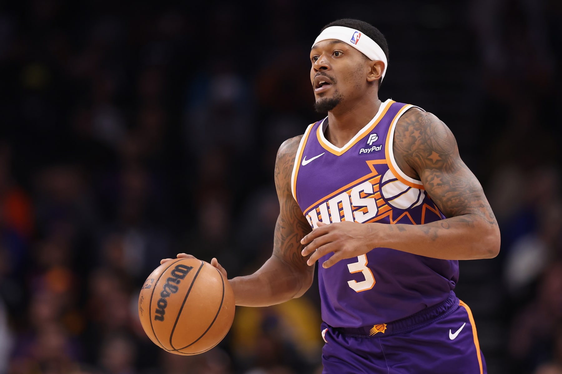 PHOENIX, ARIZONA - DECEMBER 12: Bradley Beal #3 of the Phoenix Suns handles the ball during the first half of the NBA game against the Golden State Warriors at Footprint Center on December 12, 2023 in Phoenix, Arizona. NOTE TO USER: User expressly acknowledges and agrees that, by downloading and or using this photograph, User is consenting to the terms and conditions of the Getty Images License Agreement.  (Photo by Christian Petersen/Getty Images)