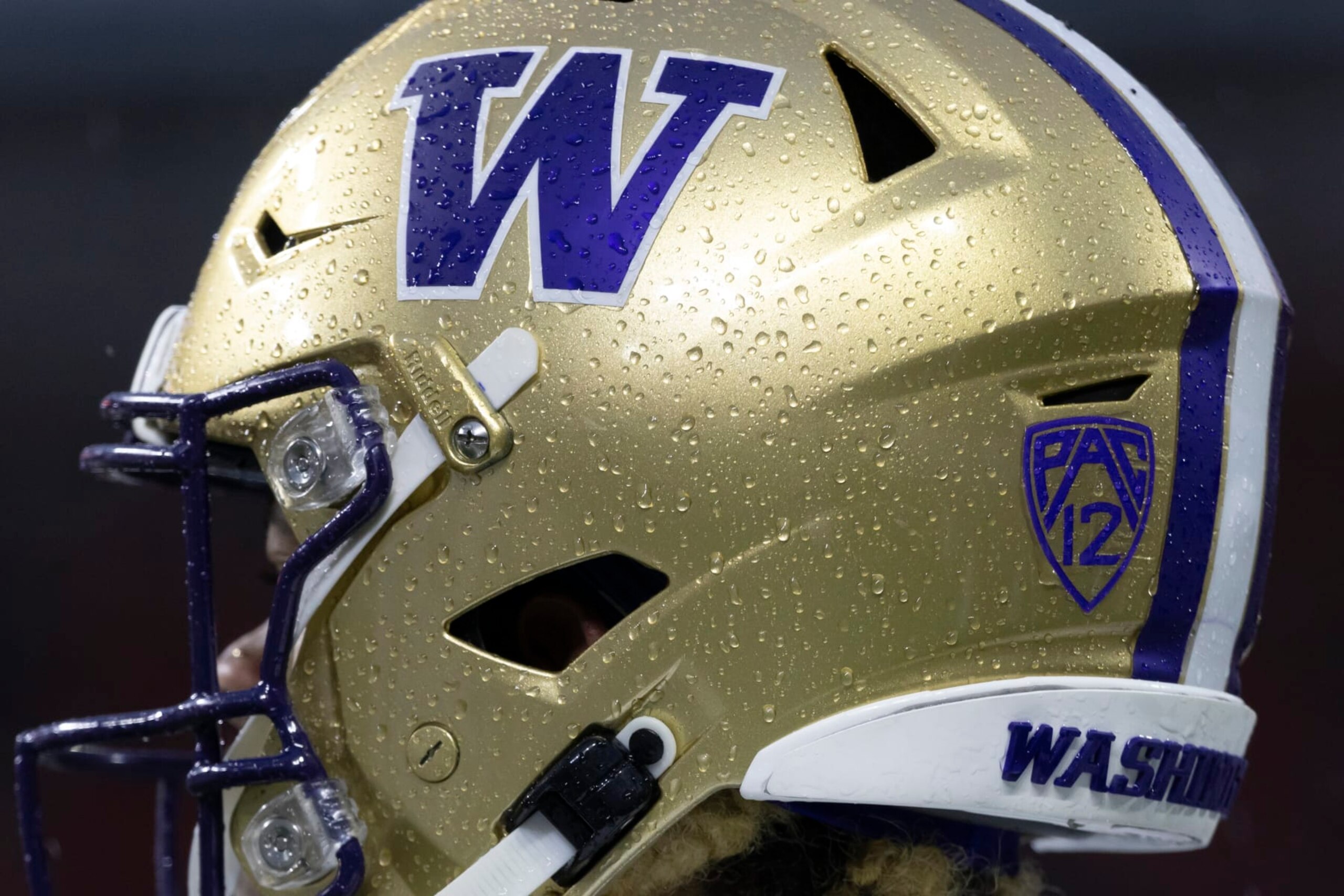 CORVALLIS, OREGON - NOVEMBER 18: A close up of wide receiver Rome Odunze #1 of the Washington Huskies helmet in the rain as he warms up against the Oregon State Beavers at Reser Stadium on November 18, 2023 in Corvallis, Oregon. (Photo by Tom Hauck/Getty Images)