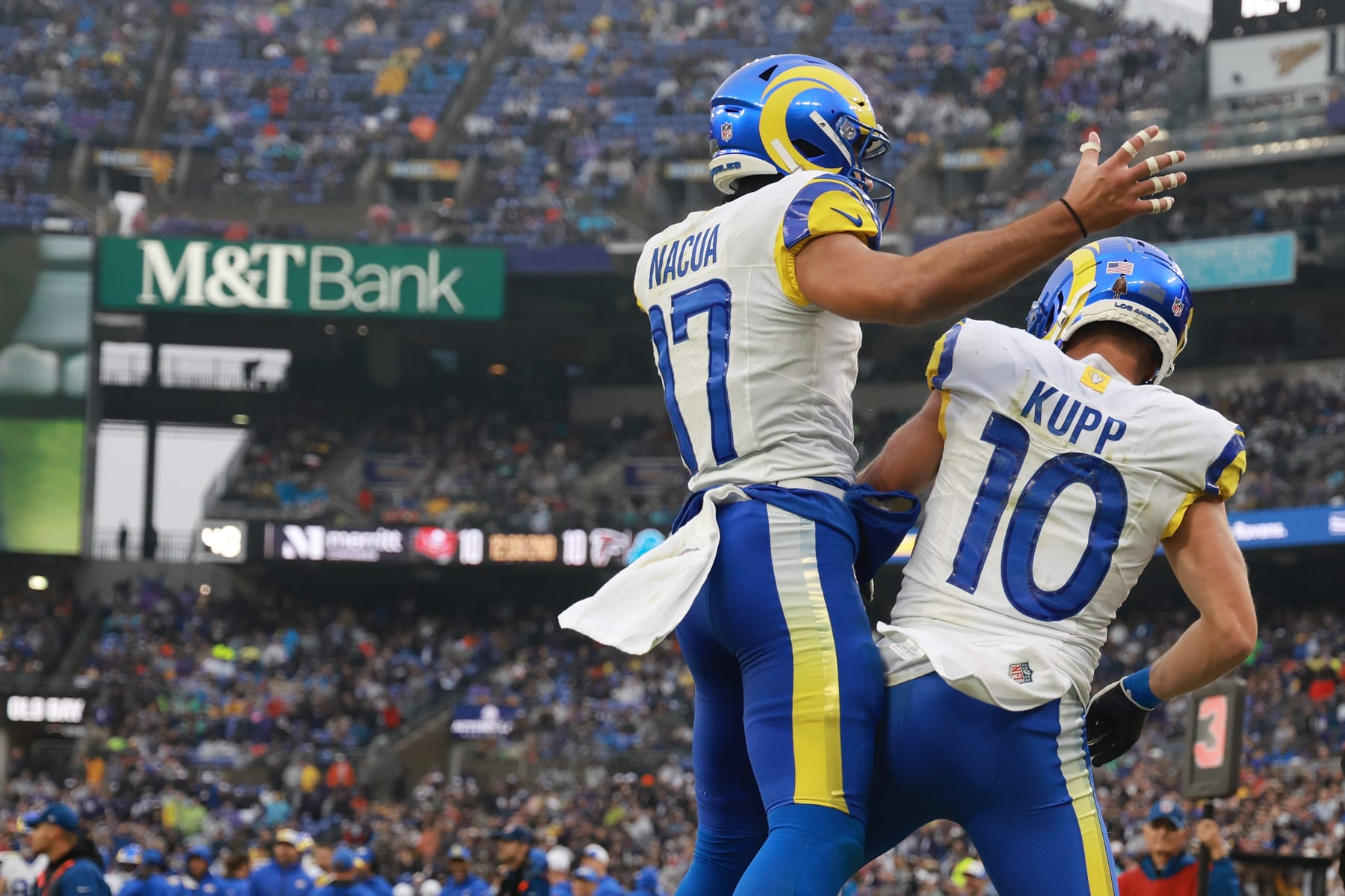 BALTIMORE, MARYLAND - DECEMBER 10: Cooper Kupp #10 of the Los Angeles Rams celebrates after a touchdown with Puka Nacua #17 during the second quarter in the game against Baltimore Ravens at M&T Bank Stadium on December 10, 2023 in Baltimore, Maryland. (Photo by Rob Carr/Getty Images)