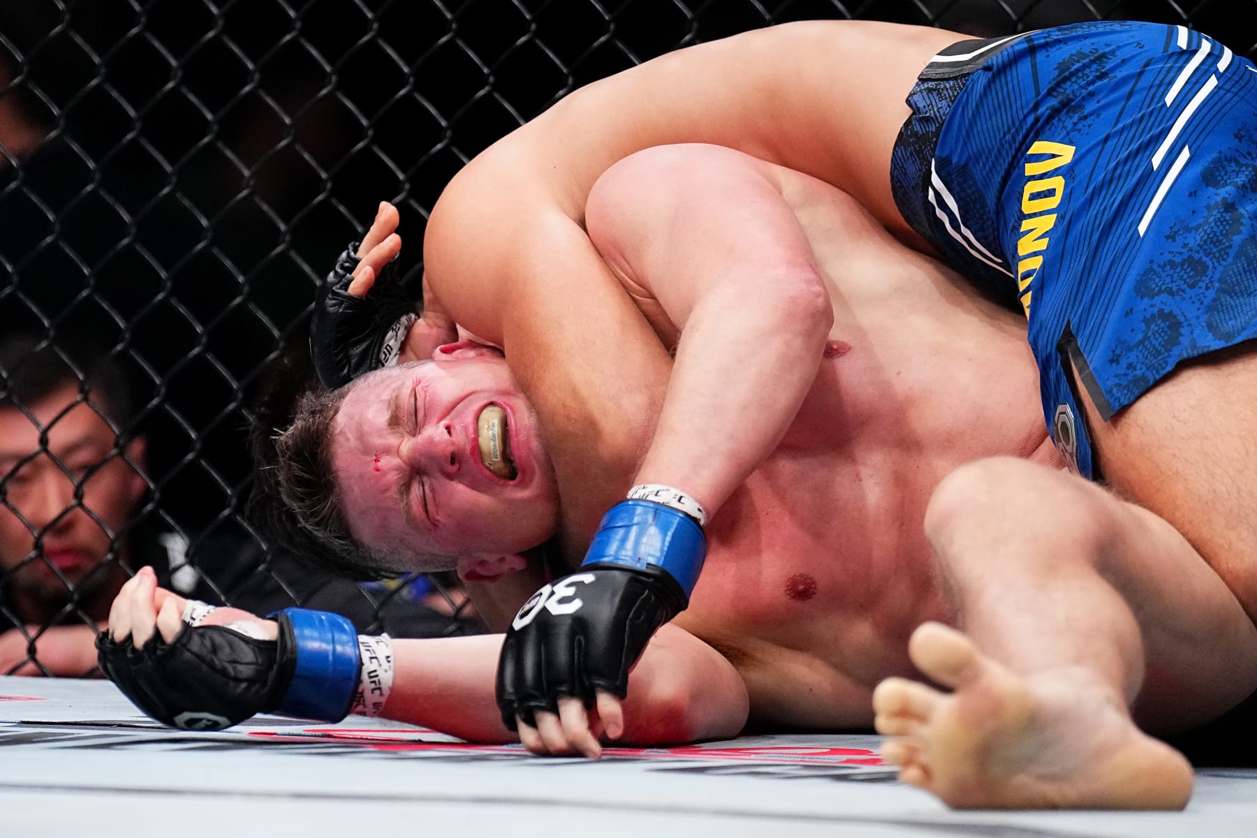 LAS VEGAS, NEVADA - DECEMBER 16: Stephen Thompson defends against Shavkat Rakhmonov of Uzbekistan in a welterweight fight during the UFC 296 event at T-Mobile Arena on December 16, 2023 in Las Vegas, Nevada. (Photo by Chris Unger/Zuffa LLC via Getty Images)