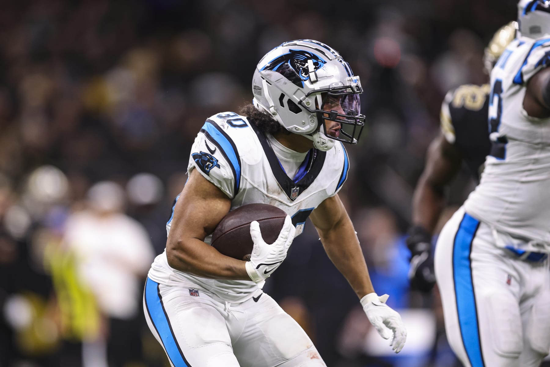 NEW ORLEANS, LA - DECEMBER 10: Chuba Hubbard #30 of the Carolina Panthers runs the ball during an NFL football game against the New Orleans Saints at Caesars Superdome on December 10, 2023 in New Orleans, LA. (Photo by Perry Knotts/Getty Images)