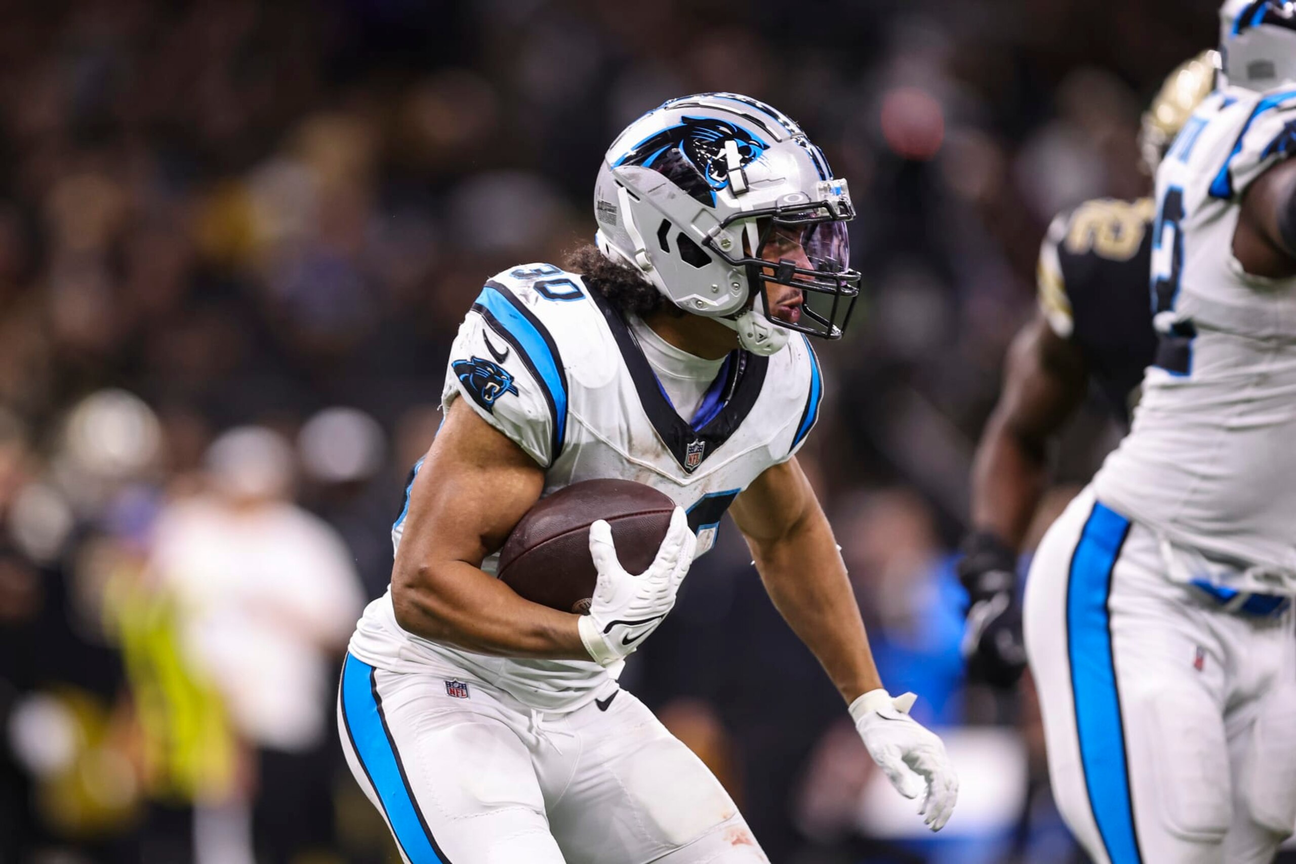 NEW ORLEANS, LA - DECEMBER 10: Chuba Hubbard #30 of the Carolina Panthers runs the ball during an NFL football game against the New Orleans Saints at Caesars Superdome on December 10, 2023 in New Orleans, LA. (Photo by Perry Knotts/Getty Images) NEW ORLEANS, LA - DECEMBER 10: Chuba Hubbard #30 of the Carolina Panthers runs the ball during an NFL football game against the New Orleans Saints at Caesars Superdome on December 10, 2023 in New Orleans, LA. (Photo by Perry Knotts/Getty Images)