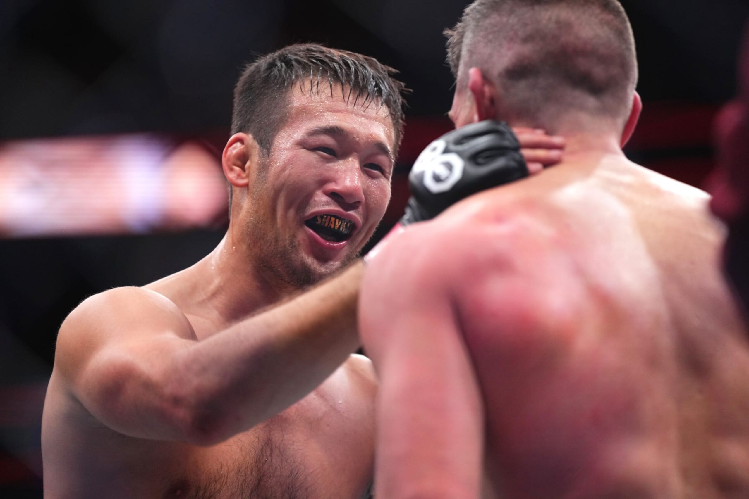 LAS VEGAS, NEVADA - DECEMBER 16: (L-R) Shavkat Rakhmonov of Uzbekistan talks to Stephen Thompson at the end of their welterweight fight during the UFC 296 event at T-Mobile Arena on December 16, 2023 in Las Vegas, Nevada. (Photo by Cooper Neill/Zuffa LLC via Getty Images)