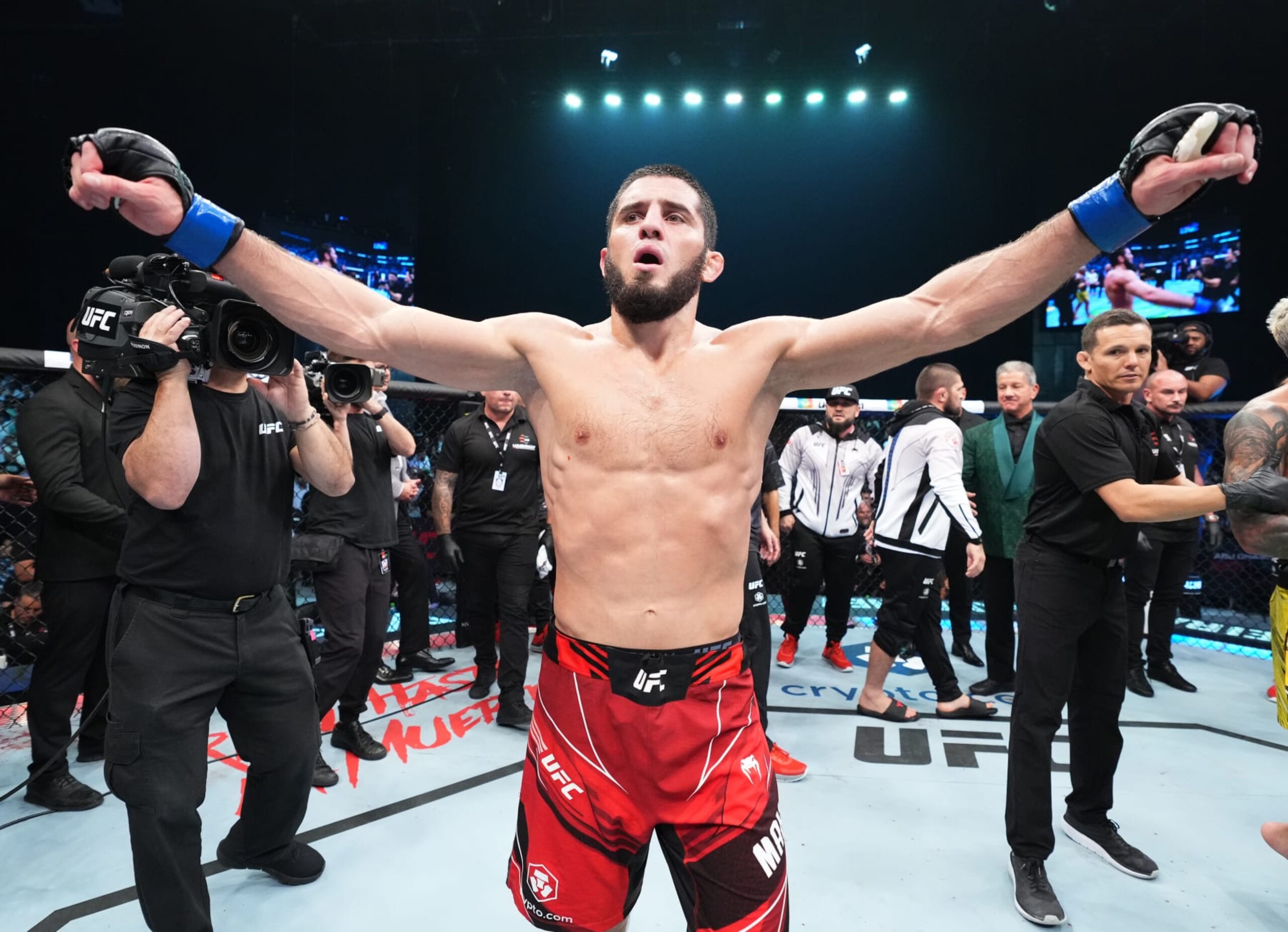 ABU DHABI, UNITED ARAB EMIRATES - OCTOBER 22: Islam Makhachev of Russia celebrates after his victory over Charles Oliveira of Brazil in their UFC lightweight championship fight during the UFC 280 event at Etihad Arena on October 22, 2022 in Abu Dhabi, United Arab Emirates. (Photo by Chris Unger/Zuffa LLC)