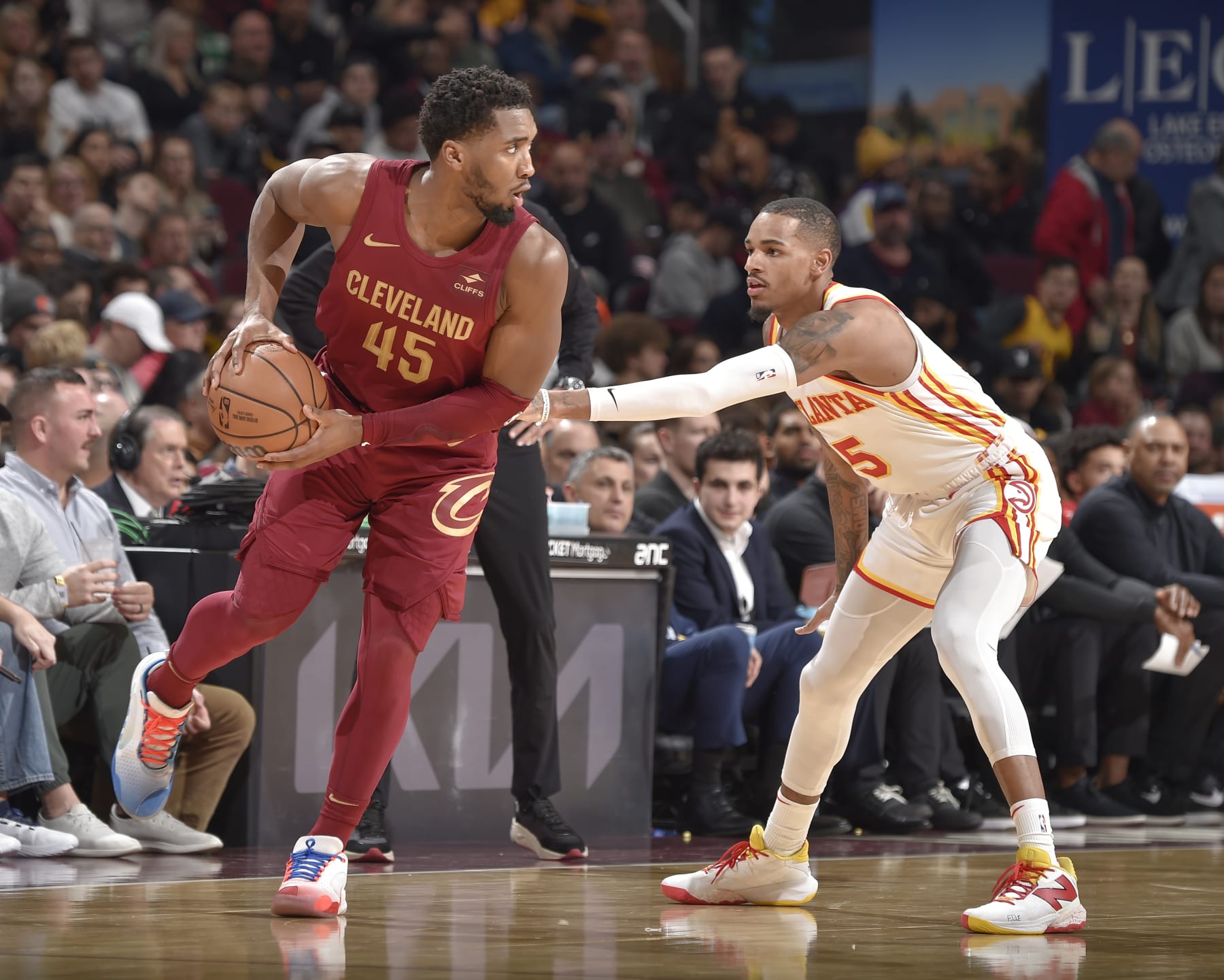CLEVELAND, OH - DECEMBER 16:  Donovan Mitchell #45 of the Cleveland Cavaliers handles the ball during the game  on December 16, 2023 at Rocket Mortgage FieldHouse in Cleveland, Ohio. NOTE TO USER: User expressly acknowledges and agrees that, by downloading and/or using this Photograph, user is consenting to the terms and conditions of the Getty Images License Agreement. Mandatory Copyright Notice: Copyright 2023 NBAE (Photo by David Liam Kyle/NBAE via Getty Images)
