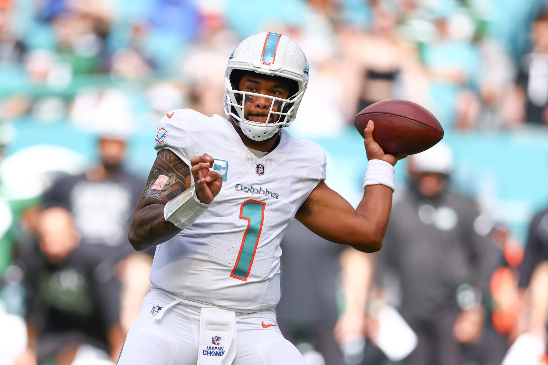 MIAMI GARDENS, FLORIDA - DECEMBER 17: Tua Tagovailoa #1 of the Miami Dolphins throws a pass during the first half of a game against the New York Jets at Hard Rock Stadium on December 17, 2023 in Miami Gardens, Florida. (Photo by Megan Briggs/Getty Images) MIAMI GARDENS, FLORIDA - DECEMBER 17: Tua Tagovailoa #1 of the Miami Dolphins throws a pass during the first half of a game against the New York Jets at Hard Rock Stadium on December 17, 2023 in Miami Gardens, Florida. (Photo by Megan Briggs/Getty Images)