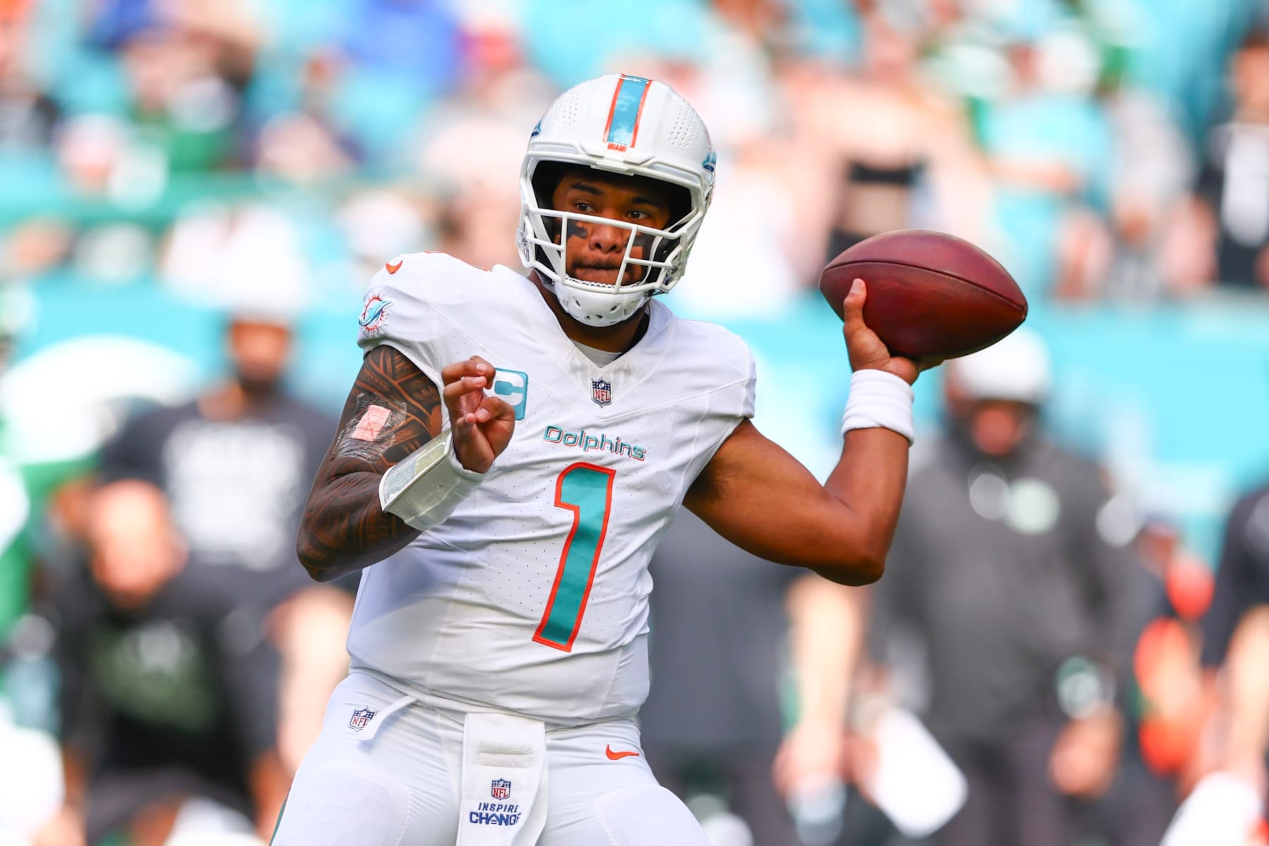 MIAMI GARDENS, FLORIDA - DECEMBER 17: Tua Tagovailoa #1 of the Miami Dolphins throws a pass during the first half of a game against the New York Jets at Hard Rock Stadium on December 17, 2023 in Miami Gardens, Florida. (Photo by Megan Briggs/Getty Images)