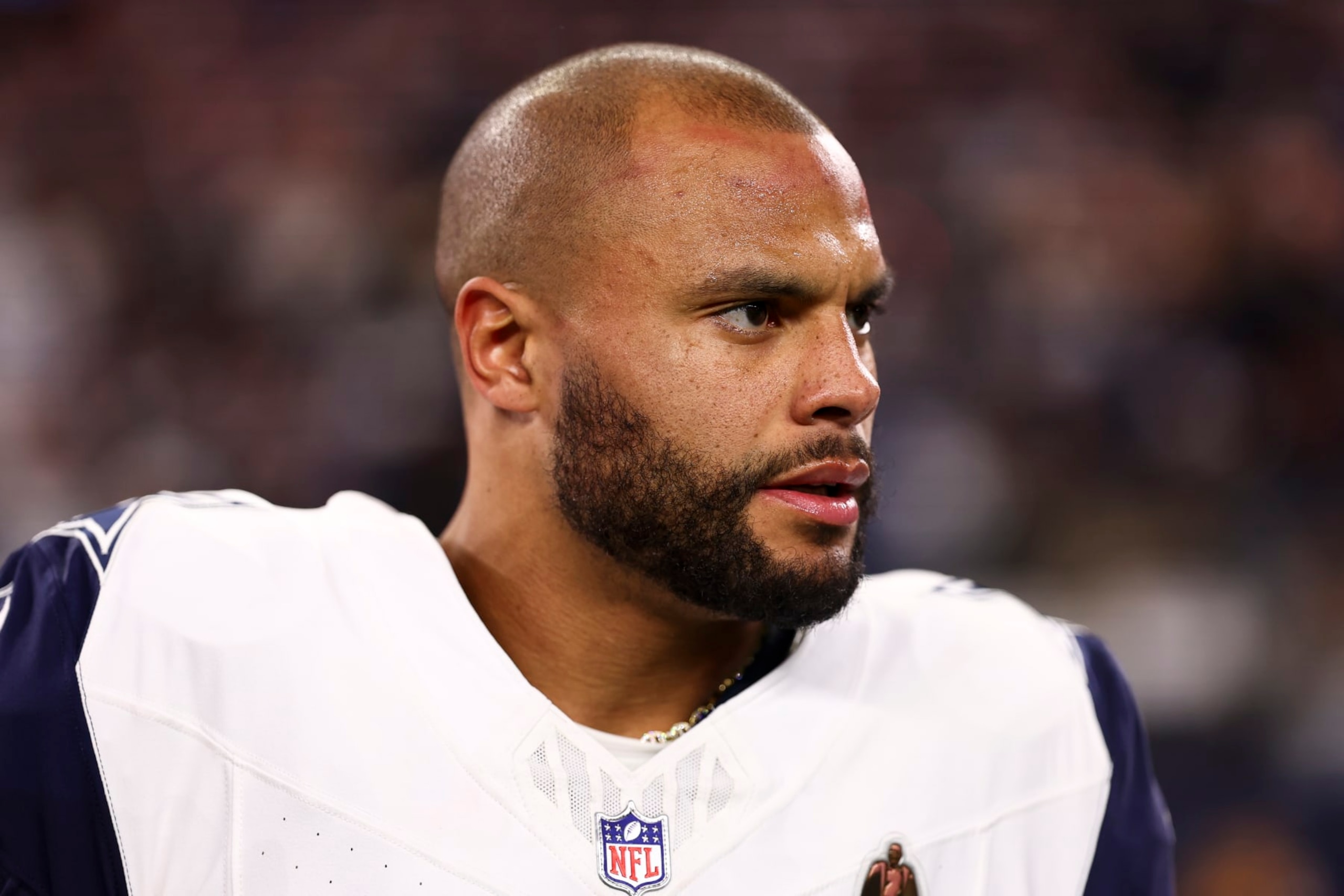 ARLINGTON, TX - DECEMBER 10: Dak Prescott #4 of the Dallas Cowboys stands on the sidelines during the national anthem prior to an NFL football game against the Philadelphia Eagles at AT&T Stadium on December 10, 2023 in Arlington, Texas. (Photo by Kevin Sabitus/Getty Images)