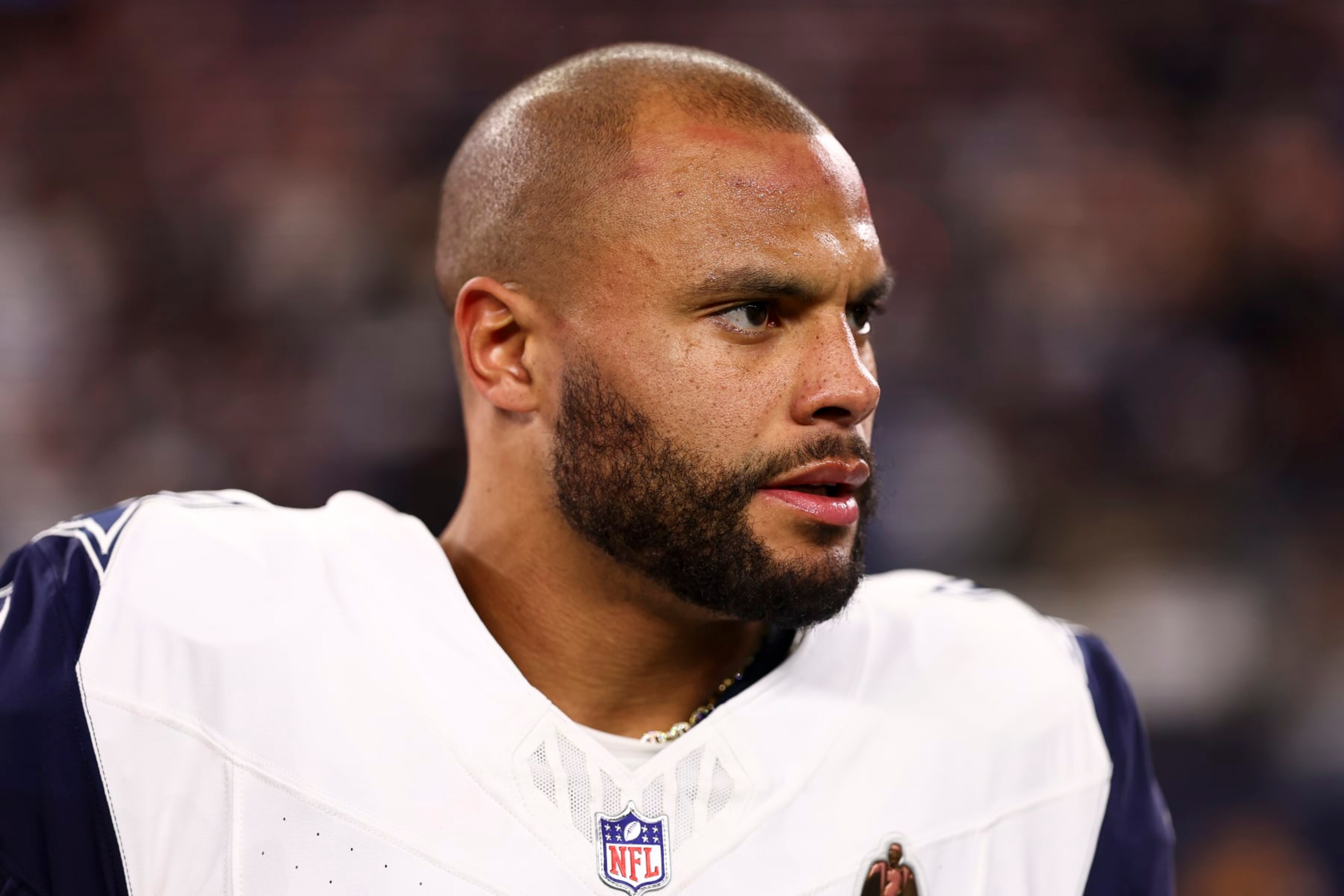 ARLINGTON, TX - DECEMBER 10: Dak Prescott #4 of the Dallas Cowboys stands on the sidelines during the national anthem prior to an NFL football game against the Philadelphia Eagles at AT&T Stadium on December 10, 2023 in Arlington, Texas. (Photo by Kevin Sabitus/Getty Images)