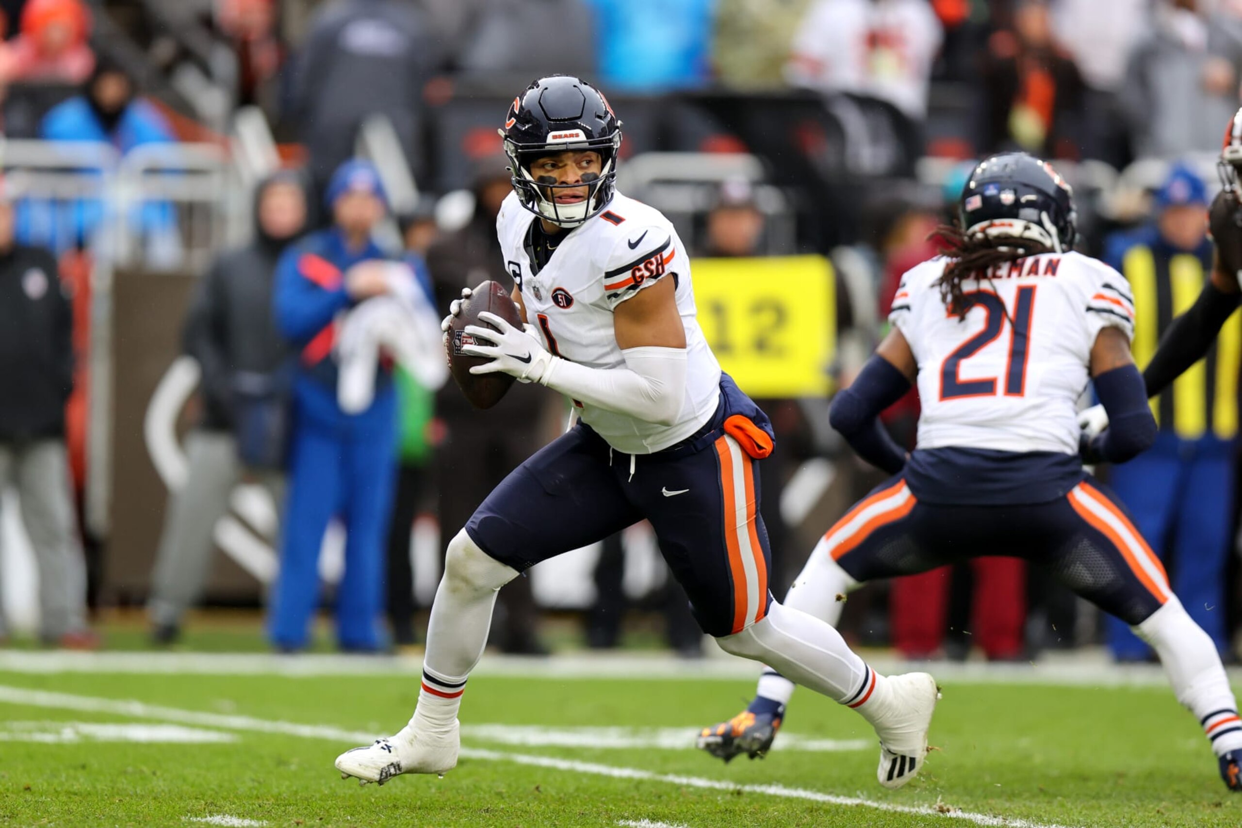 CLEVELAND, OH - DECEMBER 17: Chicago Bears quarterback Justin Fields (1) rolls out of the pocket during the first quarter of the National Football League game between the Chicago Bears and Cleveland Browns on December 17, 2023, at Cleveland Browns Stadium in Cleveland, OH. (Photo by Frank Jansky/Icon Sportswire via Getty Images) CLEVELAND, OH - DECEMBER 17: Chicago Bears quarterback Justin Fields (1) rolls out of the pocket during the first quarter of the National Football League game between the Chicago Bears and Cleveland Browns on December 17, 2023, at Cleveland Browns Stadium in Cleveland, OH. (Photo by Frank Jansky/Icon Sportswire via Getty Images)