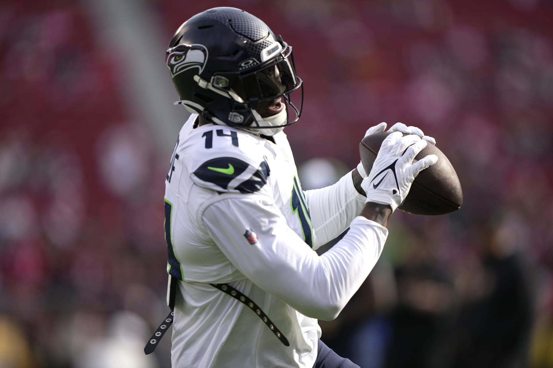 SANTA CLARA, CALIFORNIA - DECEMBER 10: DK Metcalf #14 of the Seattle Seahawks warms up prior to the game against the San Francisco 49ers at Levi's Stadium on December 10, 2023 in Santa Clara, California. (Photo by Thearon W. Henderson/Getty Images)