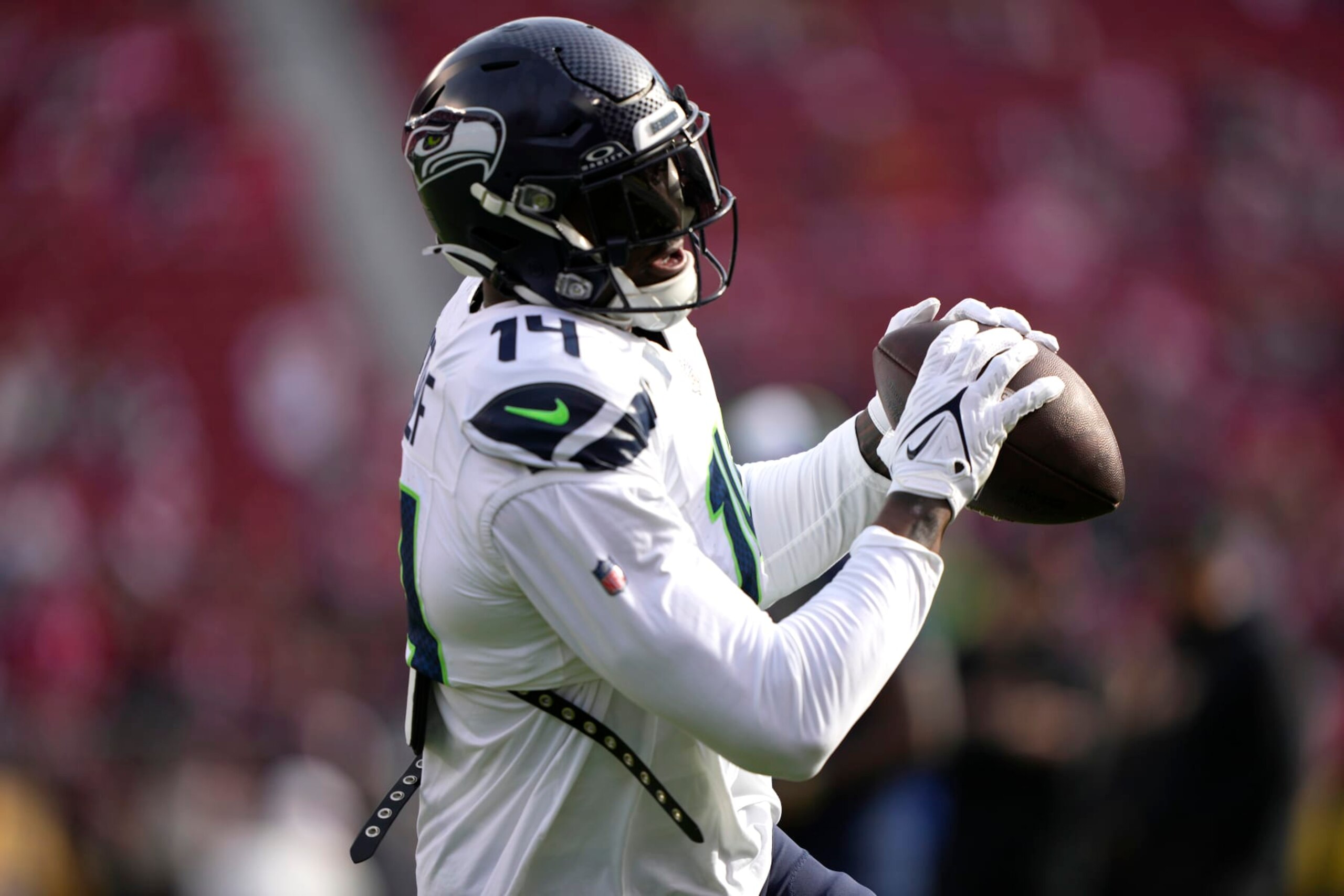 SANTA CLARA, CALIFORNIA - DECEMBER 10: DK Metcalf #14 of the Seattle Seahawks warms up prior to the game against the San Francisco 49ers at Levi's Stadium on December 10, 2023 in Santa Clara, California. (Photo by Thearon W. Henderson/Getty Images)
