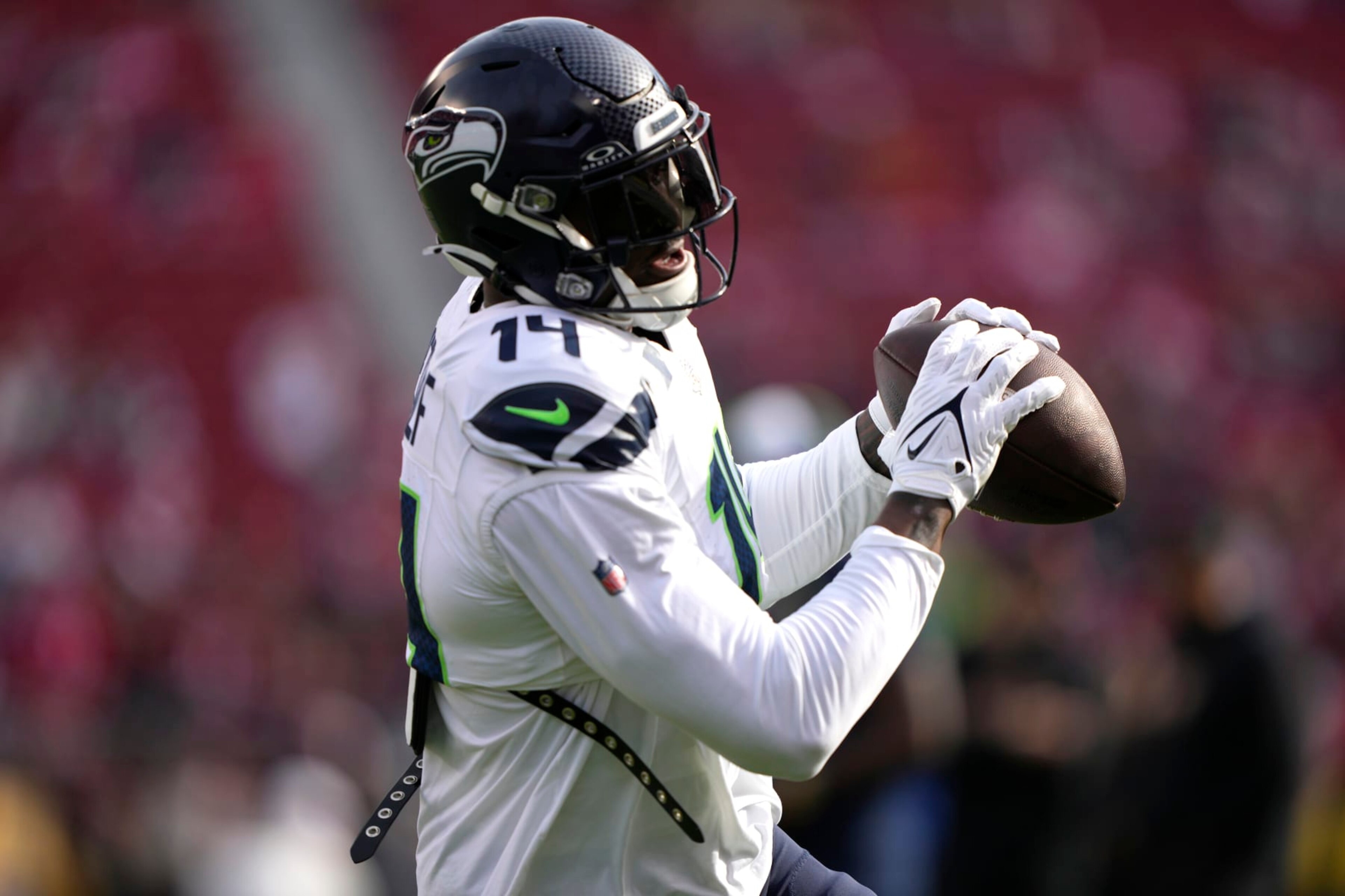 SANTA CLARA, CALIFORNIA - DECEMBER 10: DK Metcalf #14 of the Seattle Seahawks warms up prior to the game against the San Francisco 49ers at Levi's Stadium on December 10, 2023 in Santa Clara, California. (Photo by Thearon W. Henderson/Getty Images)