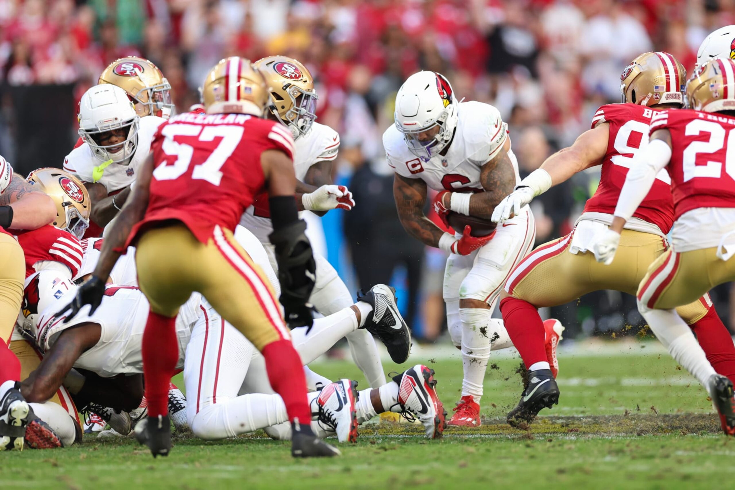 Cardinals RB James Conner runs against the 49ers
