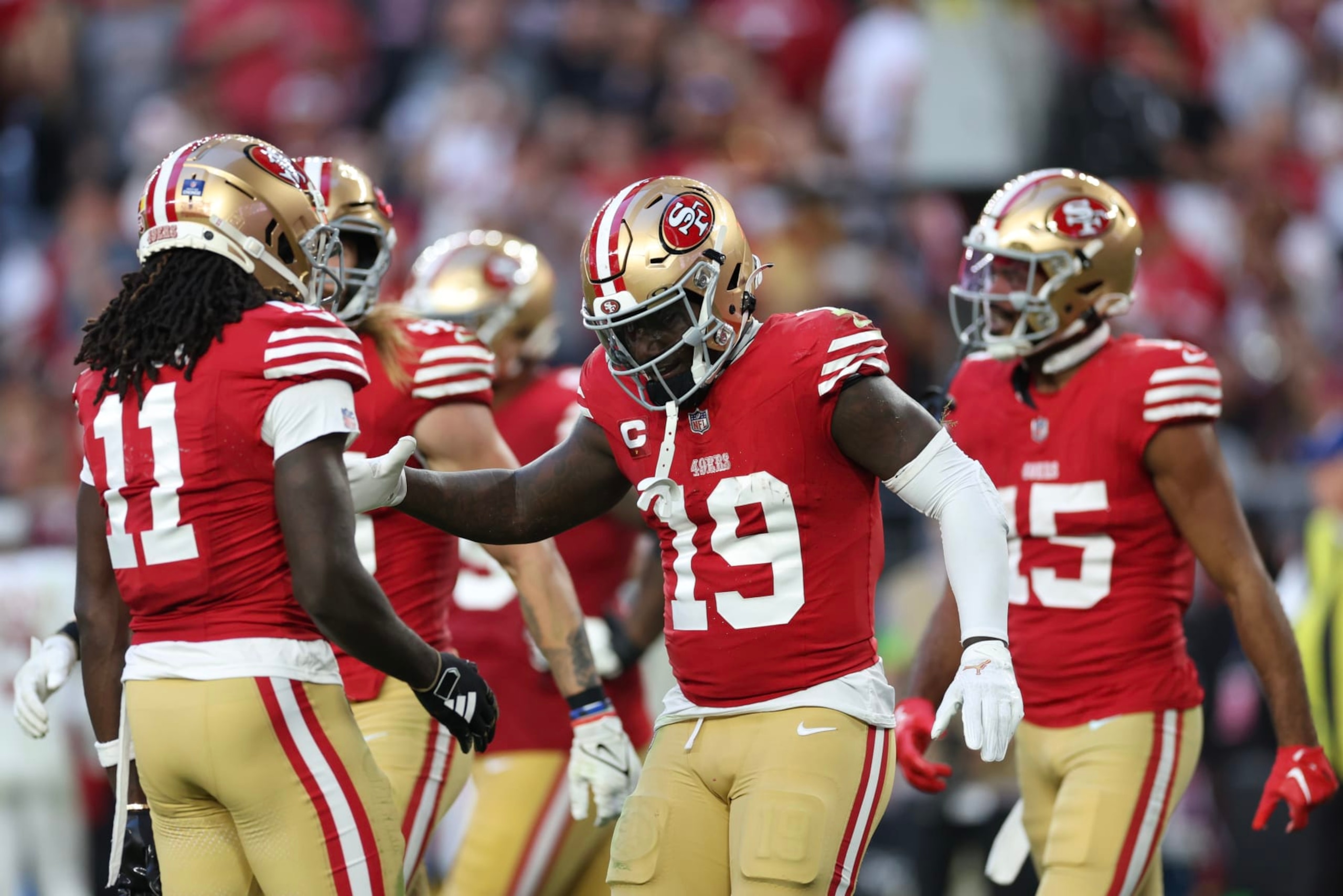 GLENDALE, ARIZONA - DECEMBER 17: Deebo Samuel #19 of the San Francisco 49ers reacts after scoring a touchdown during the fourth quarter of a game against the Arizona Cardinals at State Farm Stadium on December 17, 2023 in Glendale, Arizona. (Photo by Christian Petersen/Getty Images)
