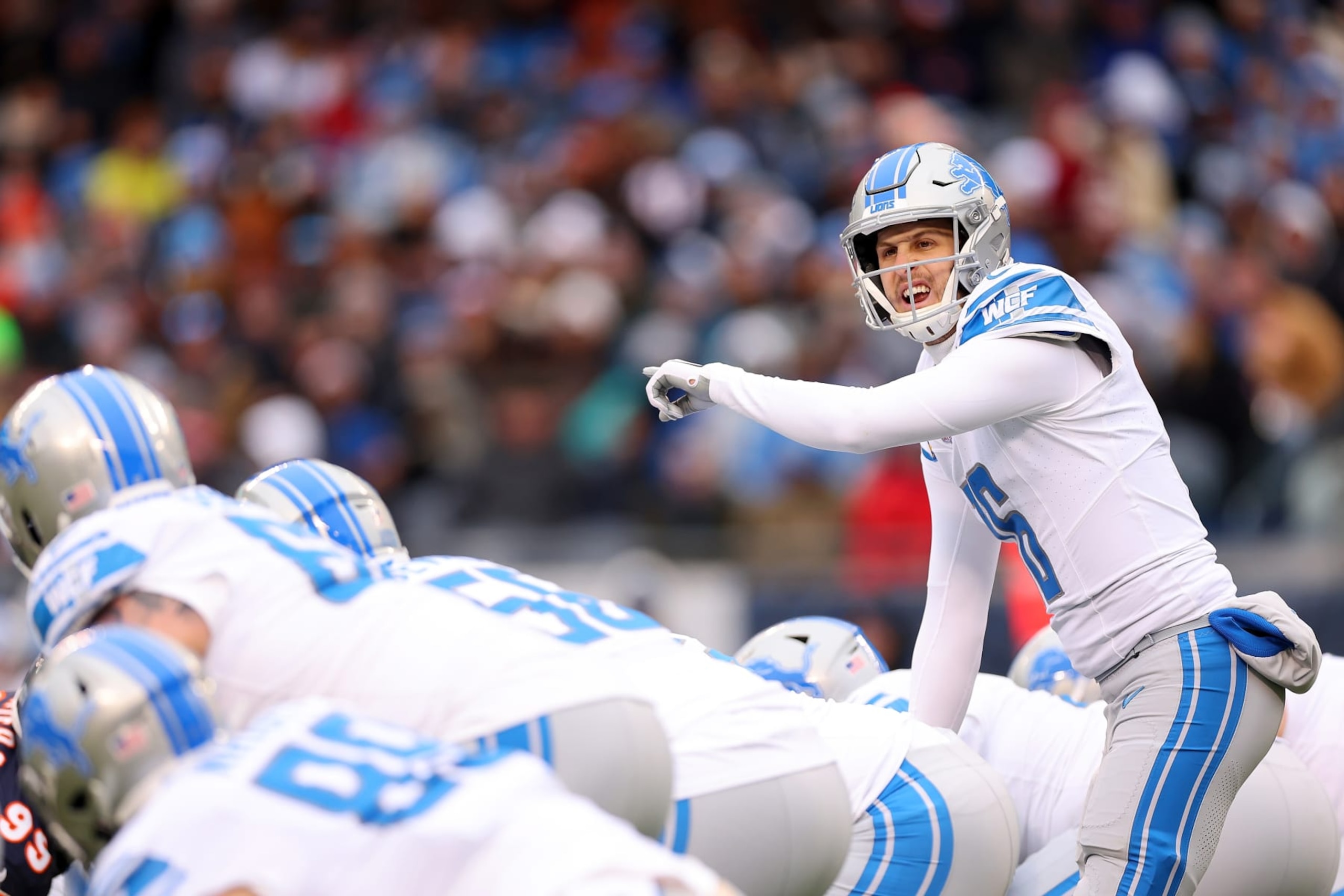 CHICAGO, ILLINOIS - DECEMBER 10: Jared Goff #16 of the Detroit Lions calls a play at the line during the third quarter against the Chicago Bears at Soldier Field on December 10, 2023 in Chicago, Illinois. (Photo by Michael Reaves/Getty Images)