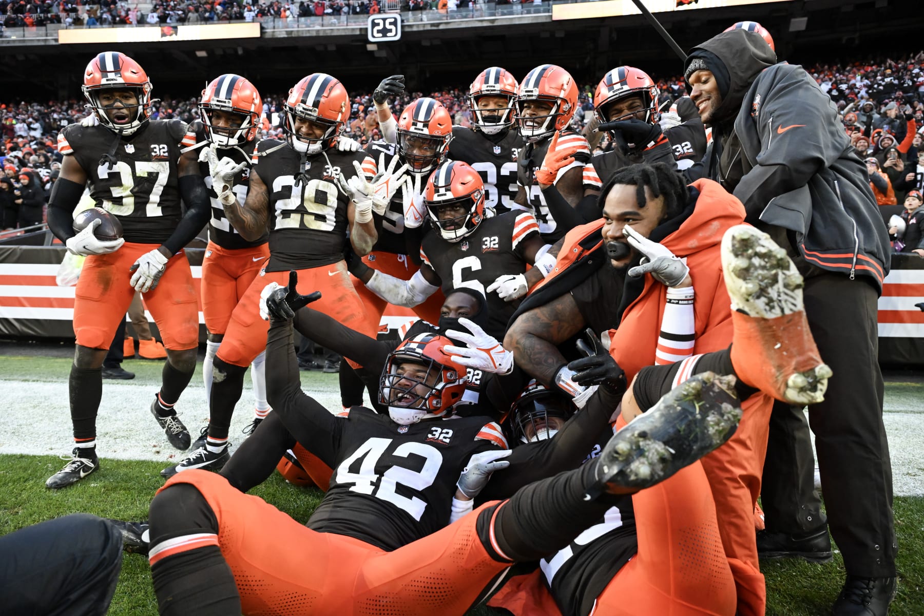 CLEVELAND, OHIO - DECEMBER 17: D'Anthony Bell #37 of the Cleveland Browns celebrates with teammates after intercepting a pass in the end zone during the fourth quarter to win the game over the Chicago Bears at Cleveland Browns Stadium on December 17, 2023 in Cleveland, Ohio. (Photo by Nick Cammett/Getty Images)