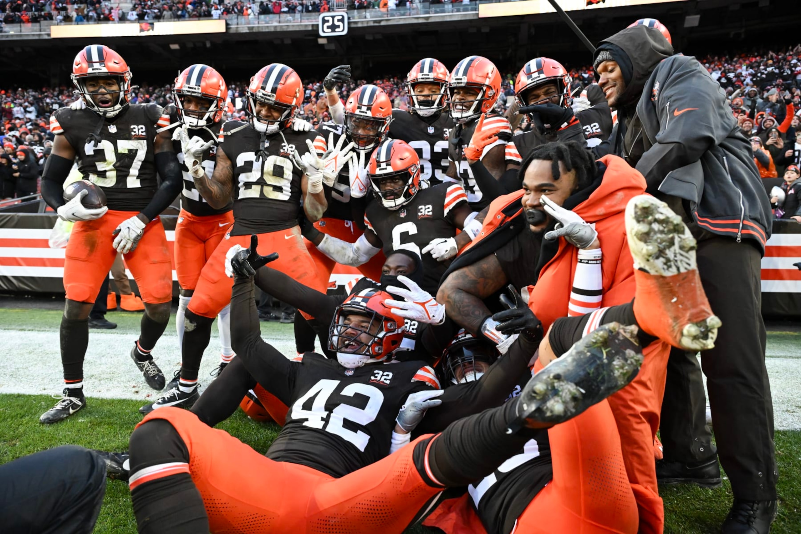 CLEVELAND, OHIO - DECEMBER 17: D'Anthony Bell #37 of the Cleveland Browns celebrates with teammates after intercepting a pass in the end zone during the fourth quarter to win the game over the Chicago Bears at Cleveland Browns Stadium on December 17, 2023 in Cleveland, Ohio. (Photo by Nick Cammett/Getty Images)