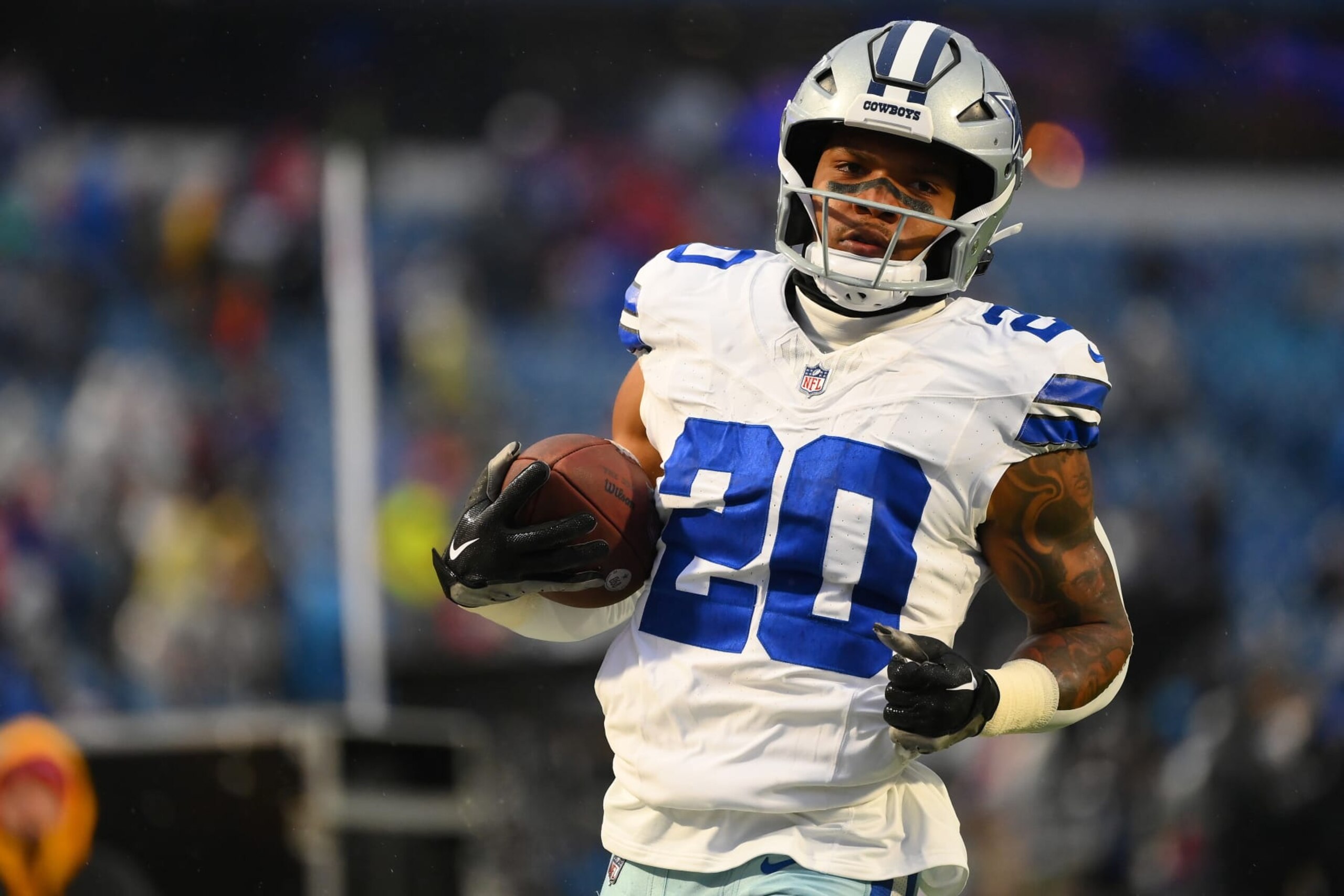 ORCHARD PARK, NEW YORK - DECEMBER 17: Tony Pollard #20 of the Dallas Cowboys warms up prior to a game against the Buffalo Bills at Highmark Stadium on December 17, 2023 in Orchard Park, New York. (Photo by Rich Barnes/Getty Images)