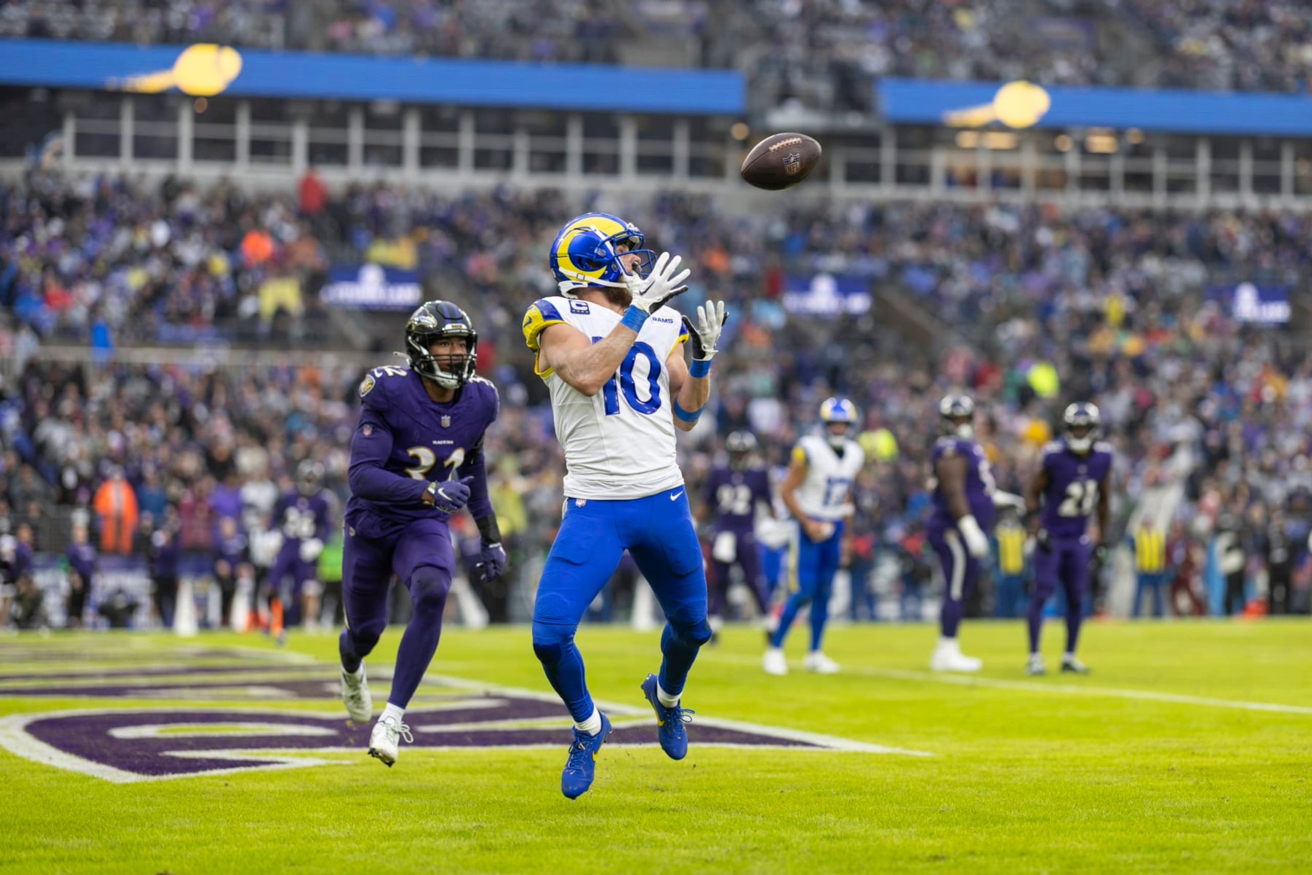 BALTIMORE, MARYLAND - DECEMBER 10: Cooper Kupp #10 of the Los Angeles Rams completes a pass for a touchdown against Marcus Williams #32 of the Baltimore Ravens during an NFL football game between the Baltimore Ravens and the Los Angeles Rams at M&T Bank Stadium on December 10, 2023 in Baltimore, Maryland. (Photo by Michael Owens/Getty Images)