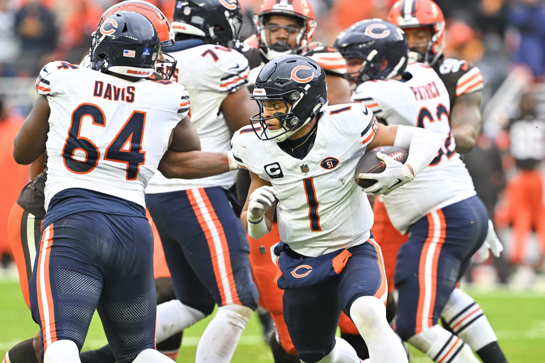 CLEVELAND, OHIO - DECEMBER 17: Justin Fields #1 of the Chicago Bears runs with the ball during the second quarter against the Cleveland Browns at Cleveland Browns Stadium on December 17, 2023 in Cleveland, Ohio. (Photo by Jason Miller/Getty Images)