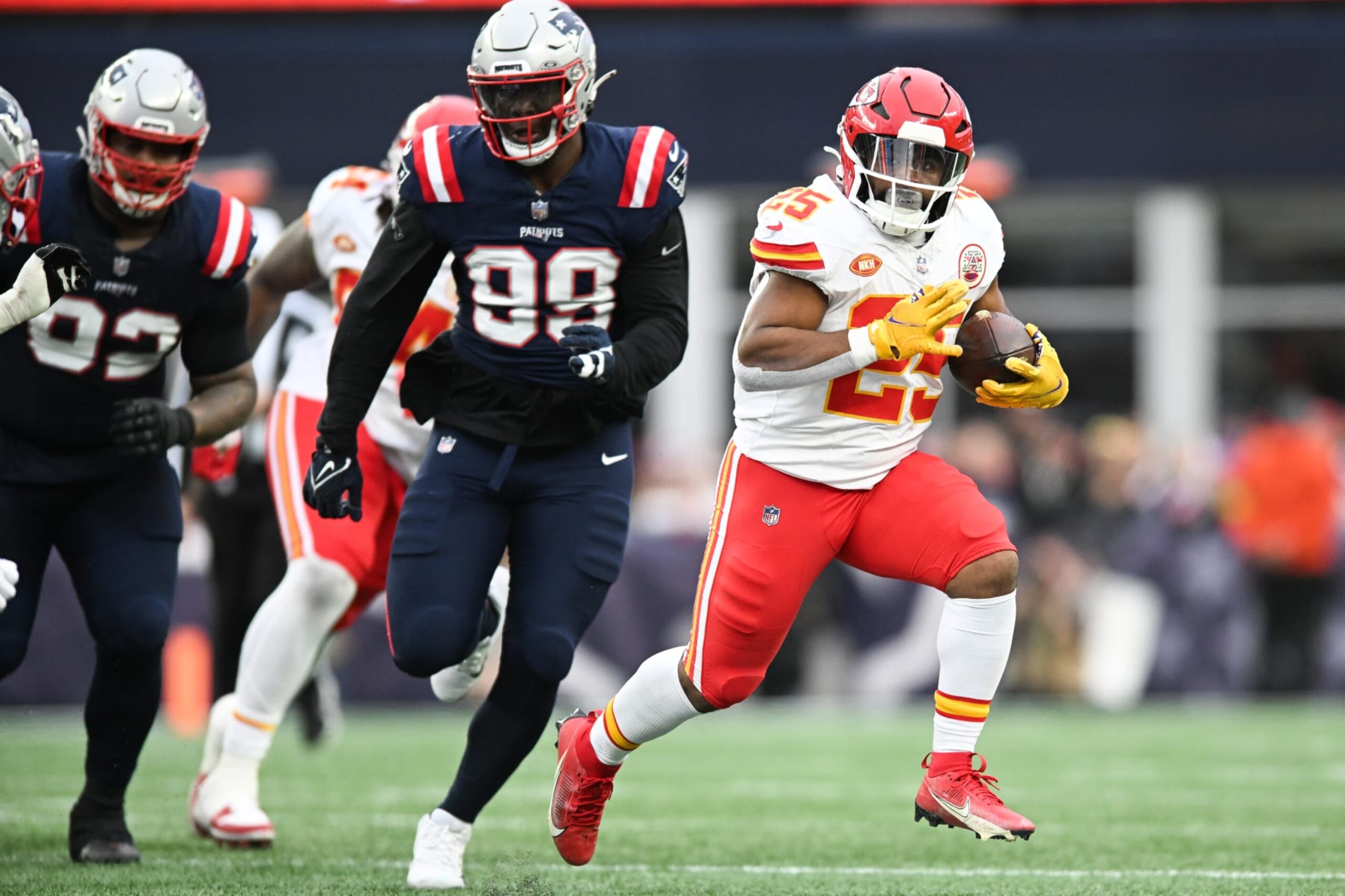FOXBORO, MA - DECEMBER 17: Clyde Edwards-Helaire #25 of the Kansas City Chiefs runs with the football during the second half against the New England Patriots at Gillette Stadium on December 17, 2023 in Foxboro, Massachusetts. (Photo by Kathryn Riley/Getty Images)