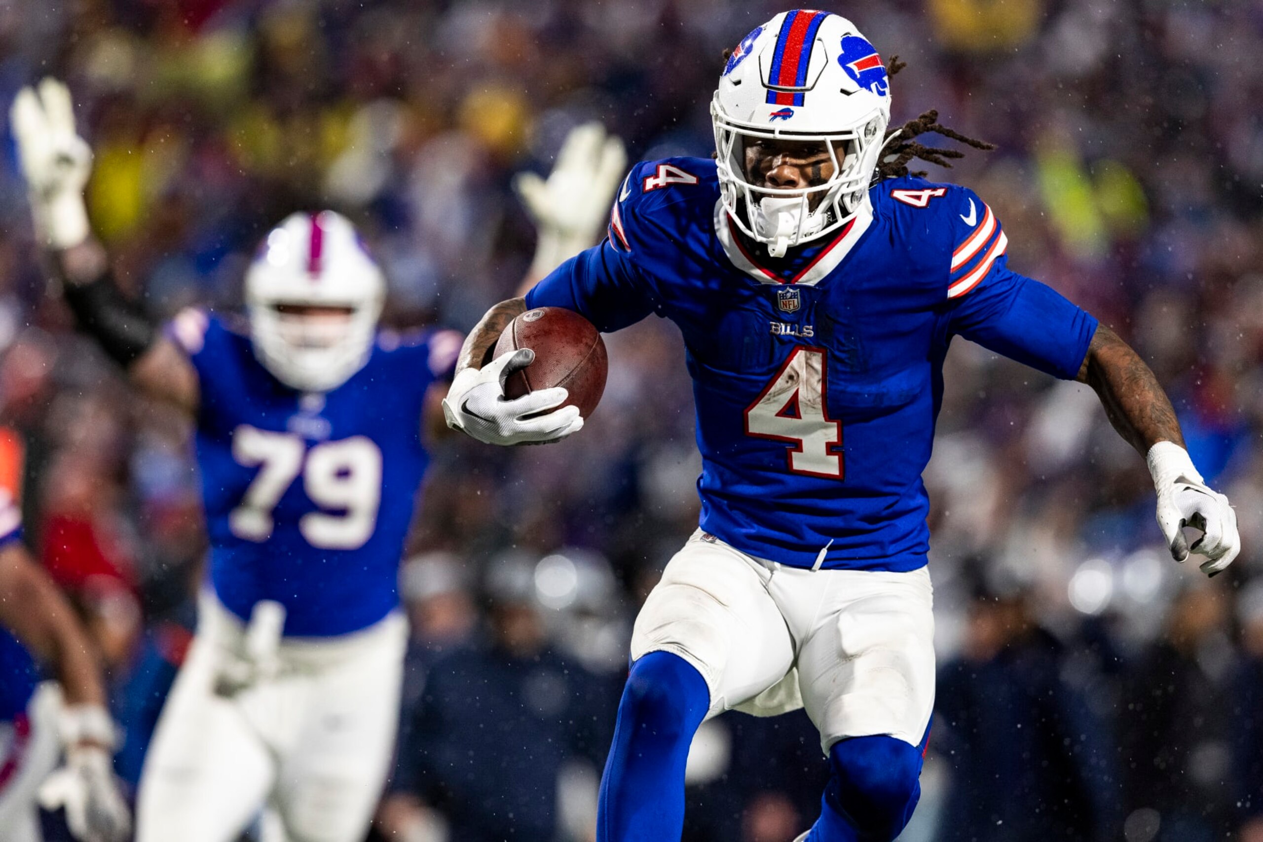 DETROIT, MICHIGAN - DECEMBER 17: James Cook #4 of the Buffalo Bills scores a touchdown during the game against the Dallas Cowboys at Highmark Stadium on December 17, 2023 in Orchard Park, New York. The Bills beat the Cowboys 31-10. (Photo by Lauren Leigh Bacho/Getty Images)