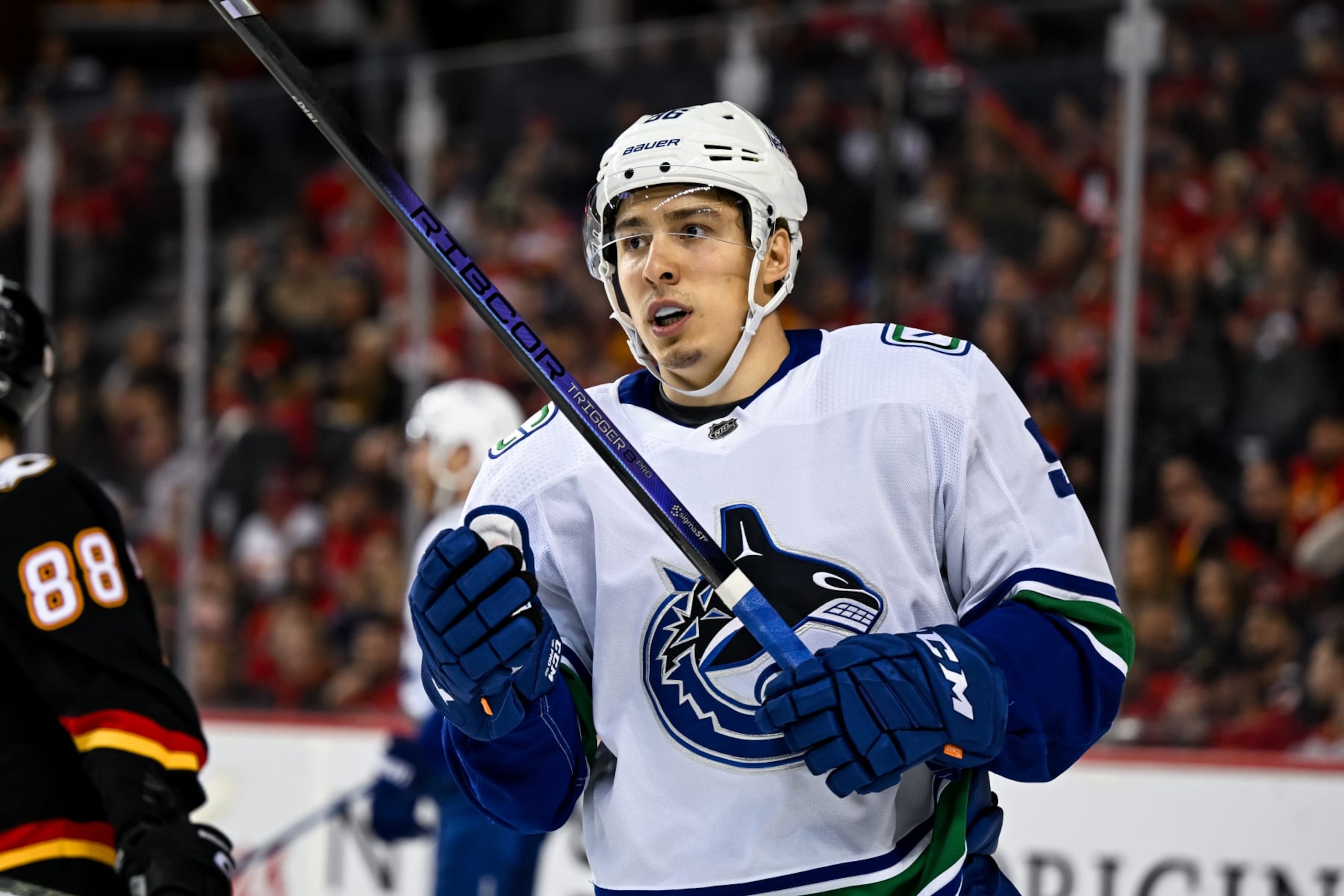 CALGARY, AB - DECEMBER 02: Vancouver Canucks Right Wing Andrei Kuzmenko (96) looks on during the first period of an NHL game between the Calgary Flames and the Vancouver Canucks on December 2, 2023, at the Scotiabank Saddledome in Calgary, AB. (Photo by Brett Holmes/Icon Sportswire via Getty Images)