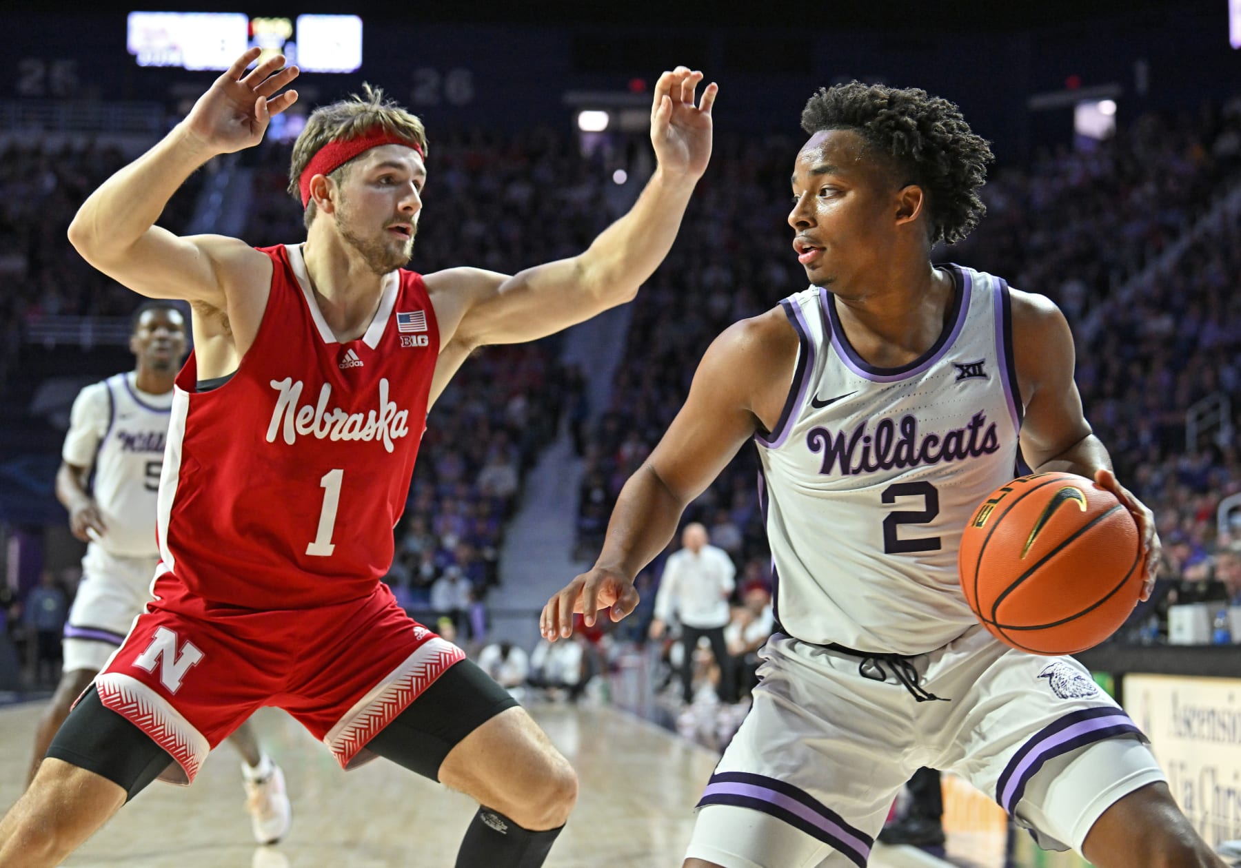 Kansas State's Tylor Perry and Nebraska's Sam Hoiberg