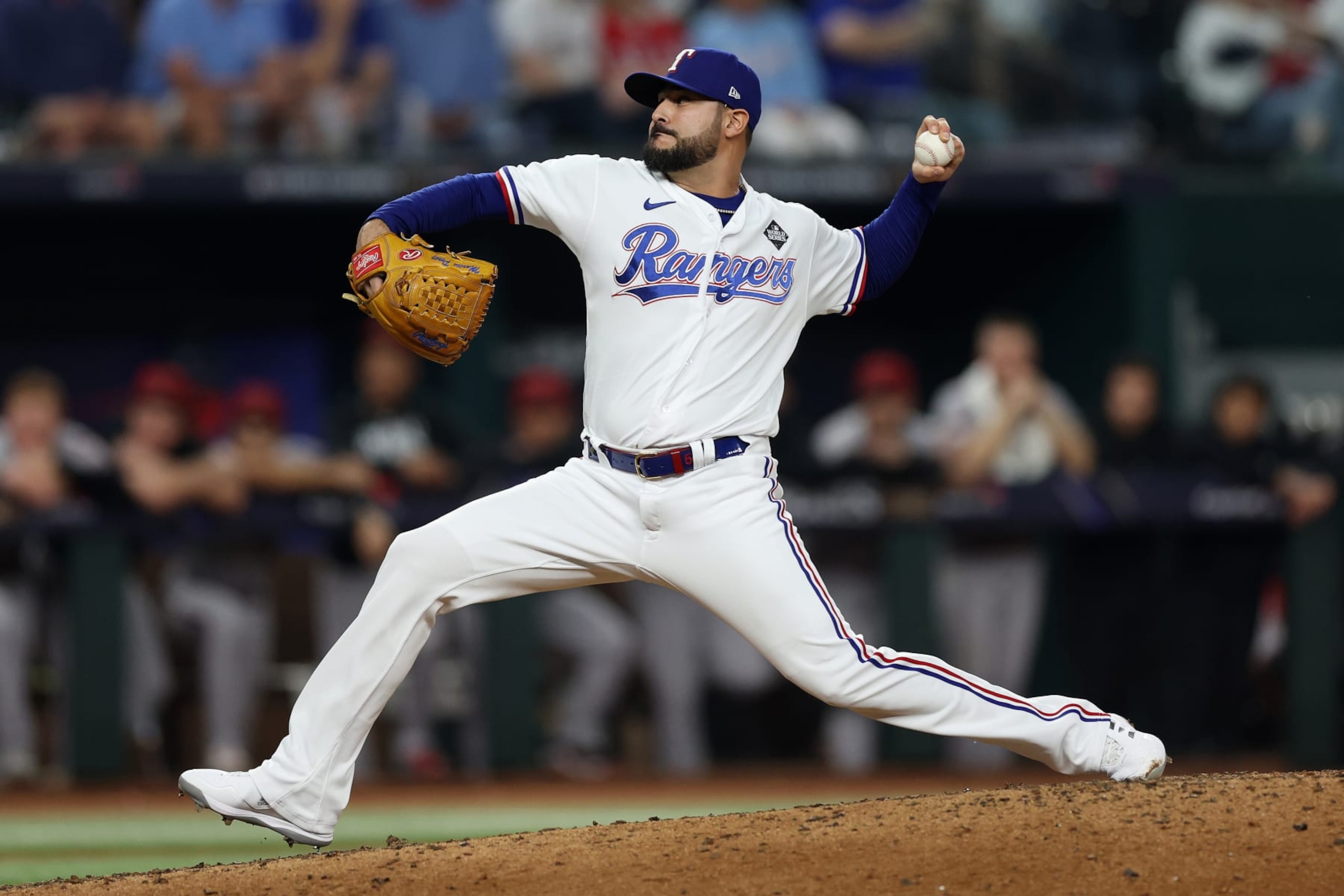 ARLINGTON, TEXAS - OCTOBER 28: Martín Pérez #54 of the Texas Rangers pitches in the eighth inning against the Arizona Diamondbacks during Game Two of the World Series at Globe Life Field on October 28, 2023 in Arlington, Texas. (Photo by Jamie Squire/Getty Images) ARLINGTON, TEXAS - OCTOBER 28: Martín Pérez #54 of the Texas Rangers pitches in the eighth inning against the Arizona Diamondbacks during Game Two of the World Series at Globe Life Field on October 28, 2023 in Arlington, Texas. (Photo by Jamie Squire/Getty Images)