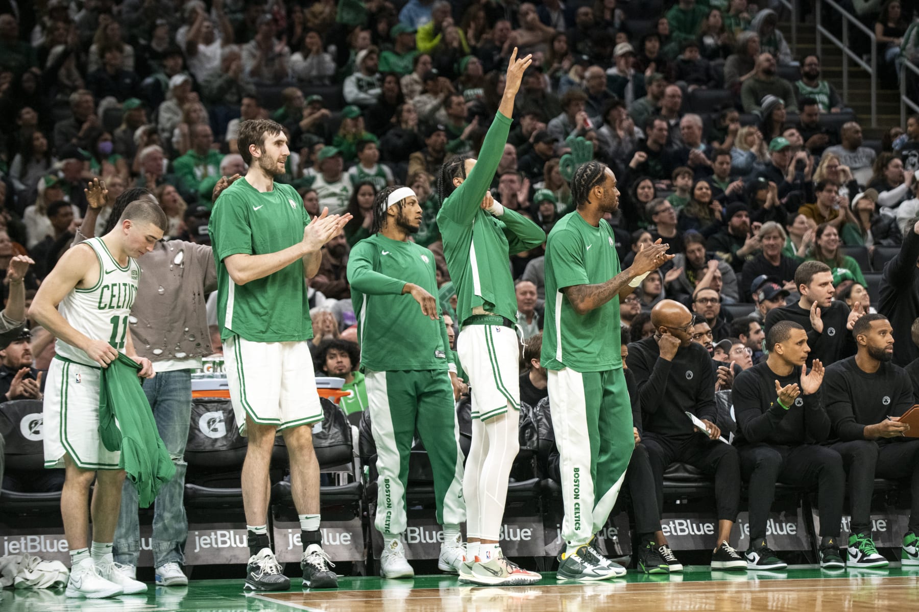 Boston, MA - November 26: The Boston Celtics bench cheers their teammates on in the fourth quarter. The Celtics beat the Atlanta Hawks, 113-103. (Photo by Tanner Pearson/The Boston Globe via Getty Images)