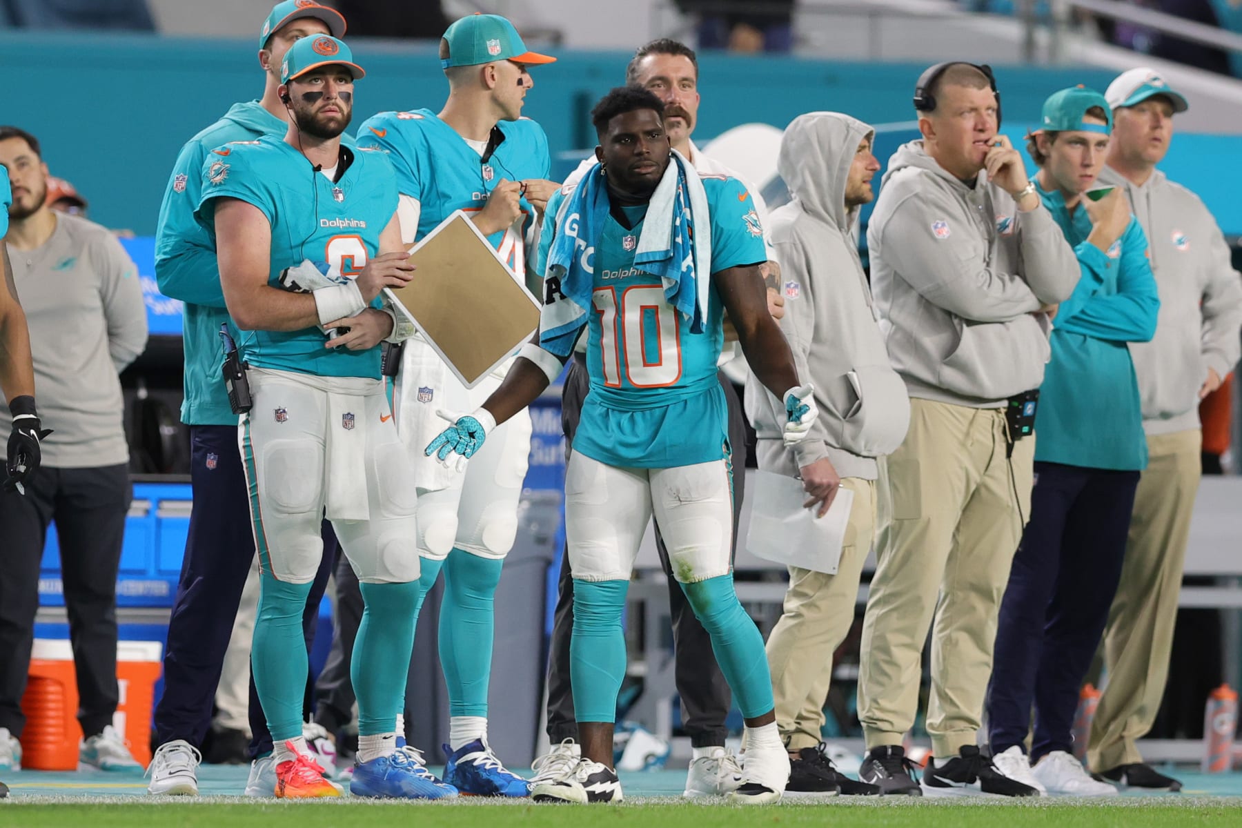 MIAMI GARDENS, FLORIDA - DECEMBER 11: Tyreek Hill #10 of the Miami Dolphins reacts on the sidelines in the first half against the Tennessee Titans at Hard Rock Stadium on December 11, 2023 in Miami Gardens, Florida. (Photo by Megan Briggs/Getty Images)