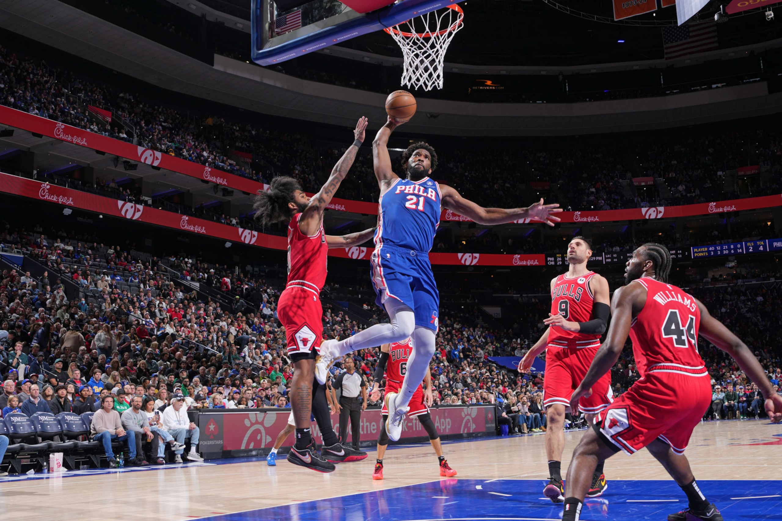 PHILADELPHIA, PA - DECEMBER 18: Joel Embiid #21 of the Philadelphia 76ers drives to the basket during the game against the Chicago Bulls on December 18, 2023 at the Wells Fargo Center in Philadelphia, Pennsylvania NOTE TO USER: User expressly acknowledges and agrees that, by downloading and/or using this Photograph, user is consenting to the terms and conditions of the Getty Images License Agreement. Mandatory Copyright Notice: Copyright 2023 NBAE (Photo by Jesse D. Garrabrant/NBAE via Getty Images)