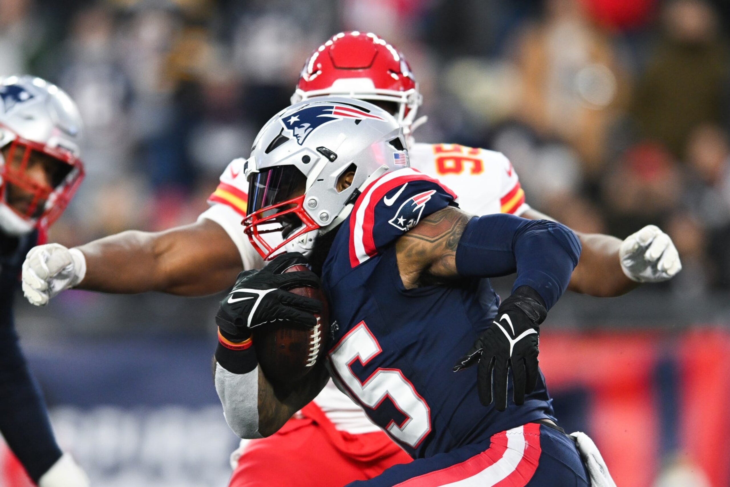 FOXBORO, MA - DECEMBER 17: Ezekiel Elliott #15 of the New England Patriots runs with the football during the second half against the Kansas City Chiefs at Gillette Stadium on December 17, 2023 in Foxboro, Massachusetts. (Photo by Kathryn Riley/Getty Images)