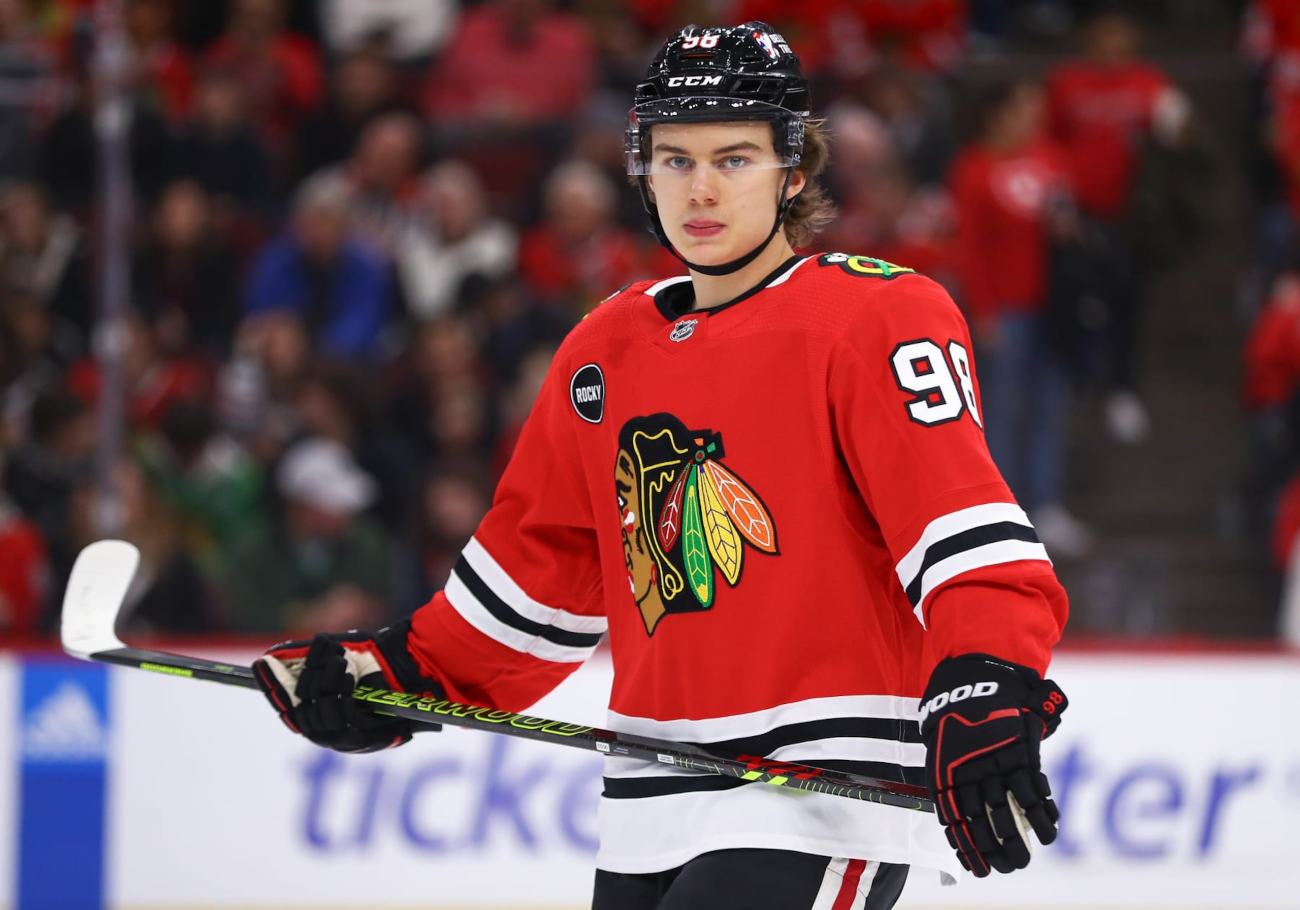 CHICAGO, IL - DECEMBER 17: Connor Bedard #98 of the Chicago Blackhawks looks on during the first period against the Vancouver Canucks at the United Center on December, 17, 2023 in Chicago, Illinois. (Photo by Melissa Tamez/Icon Sportswire via Getty Images)