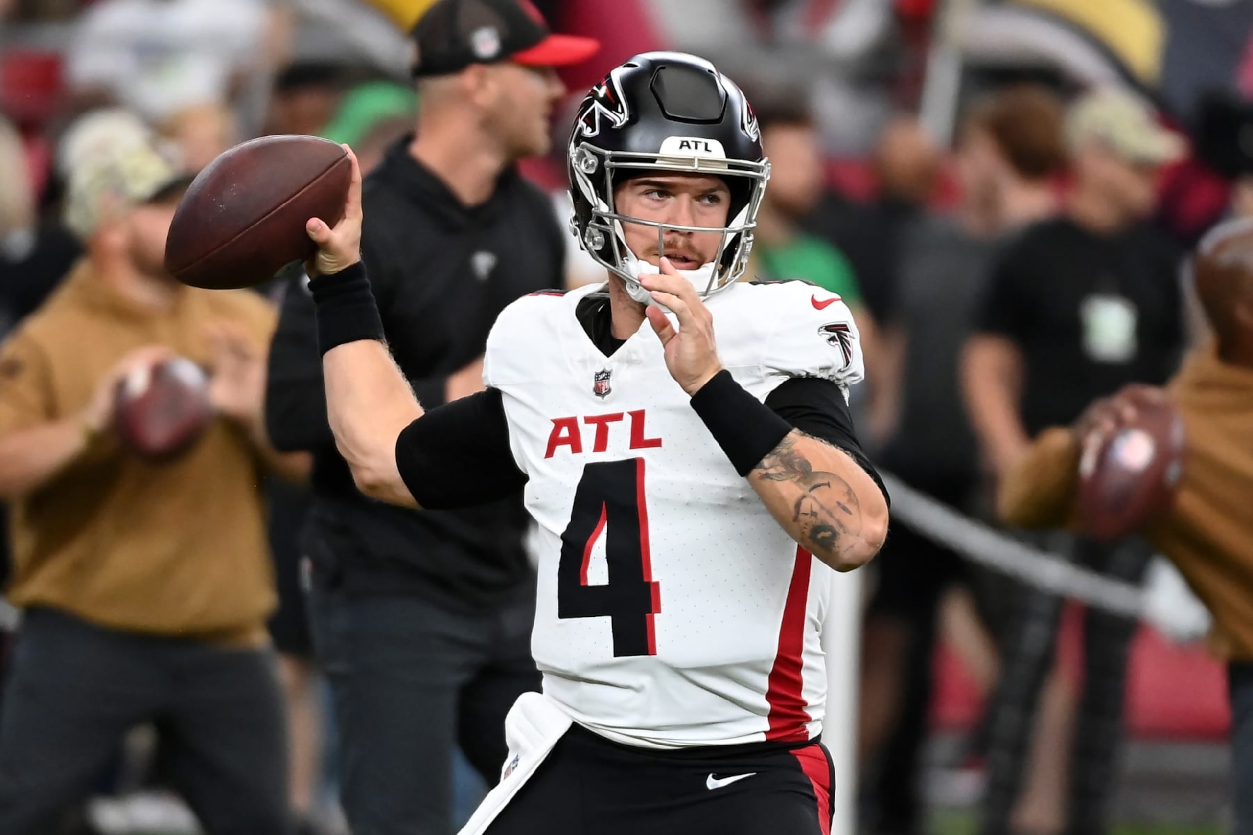 GLENDALE, ARIZONA - NOVEMBER 12: Taylor Heinicke #4 of the Atlanta Falcons warms-up prior to a game against the Arizona Cardinals at State Farm Stadium on November 12, 2023 in Glendale, Arizona. (Photo by Norm Hall/Getty Images)