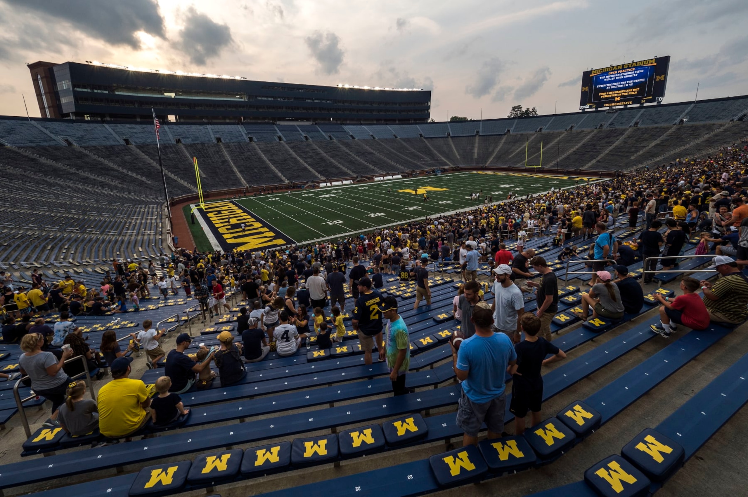 An overview of Michigan Stadium after a preseason open practice session by the NCAA college football team in Ann Arbor, Mich., Sunday, Aug. 26, 2018. Michigan's field features new blue end zones. (AP Photo/Tony Ding)