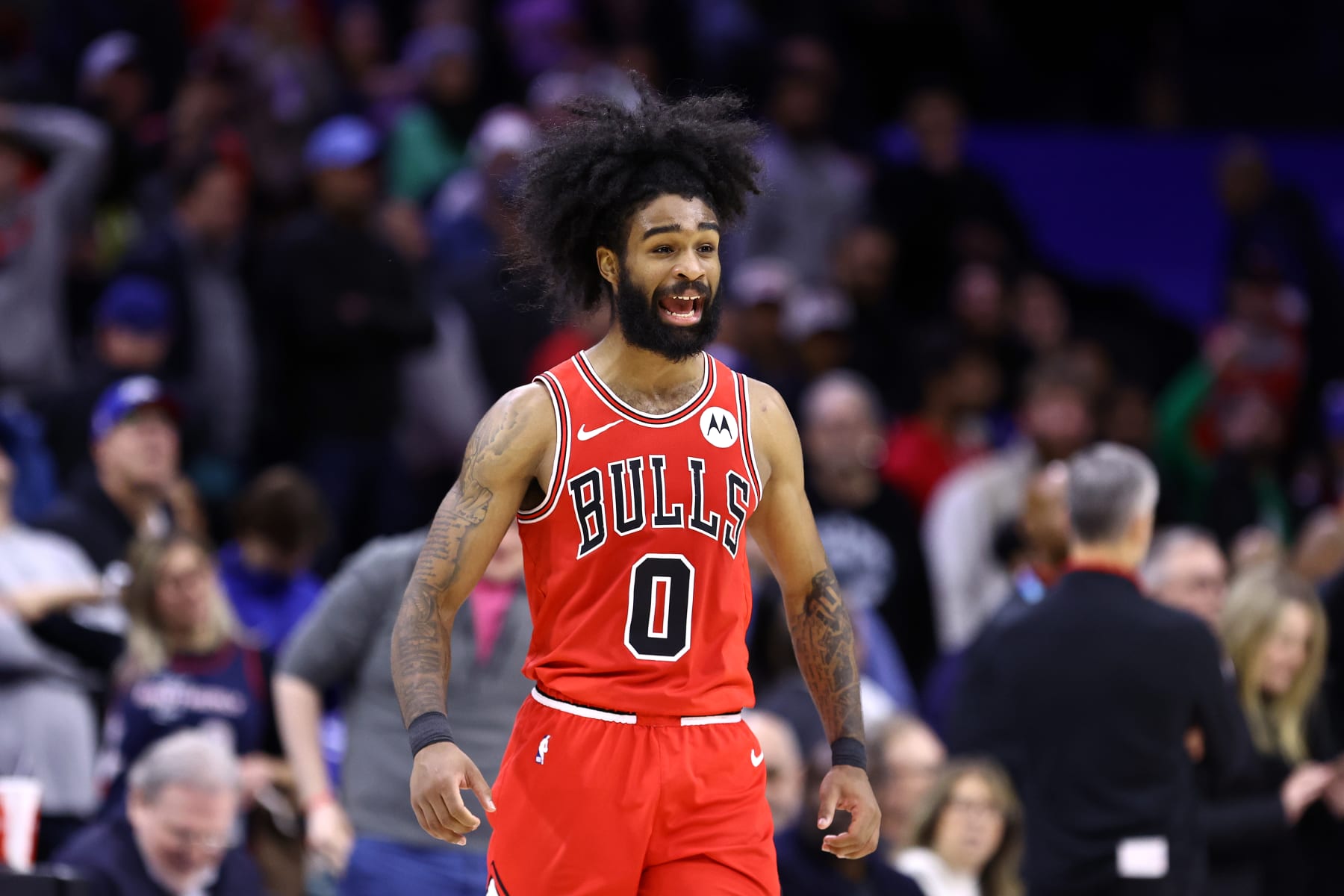 PHILADELPHIA, PENNSYLVANIA - DECEMBER 18: Coby White #0 of the Chicago Bulls reacts during the fourth quarter against the Philadelphia 76ers at the Wells Fargo Center on December 18, 2023 in Philadelphia, Pennsylvania. NOTE TO USER: User expressly acknowledges and agrees that, by downloading and or using this photograph, User is consenting to the terms and conditions of the Getty Images License Agreement. (Photo by Tim Nwachukwu/Getty Images)