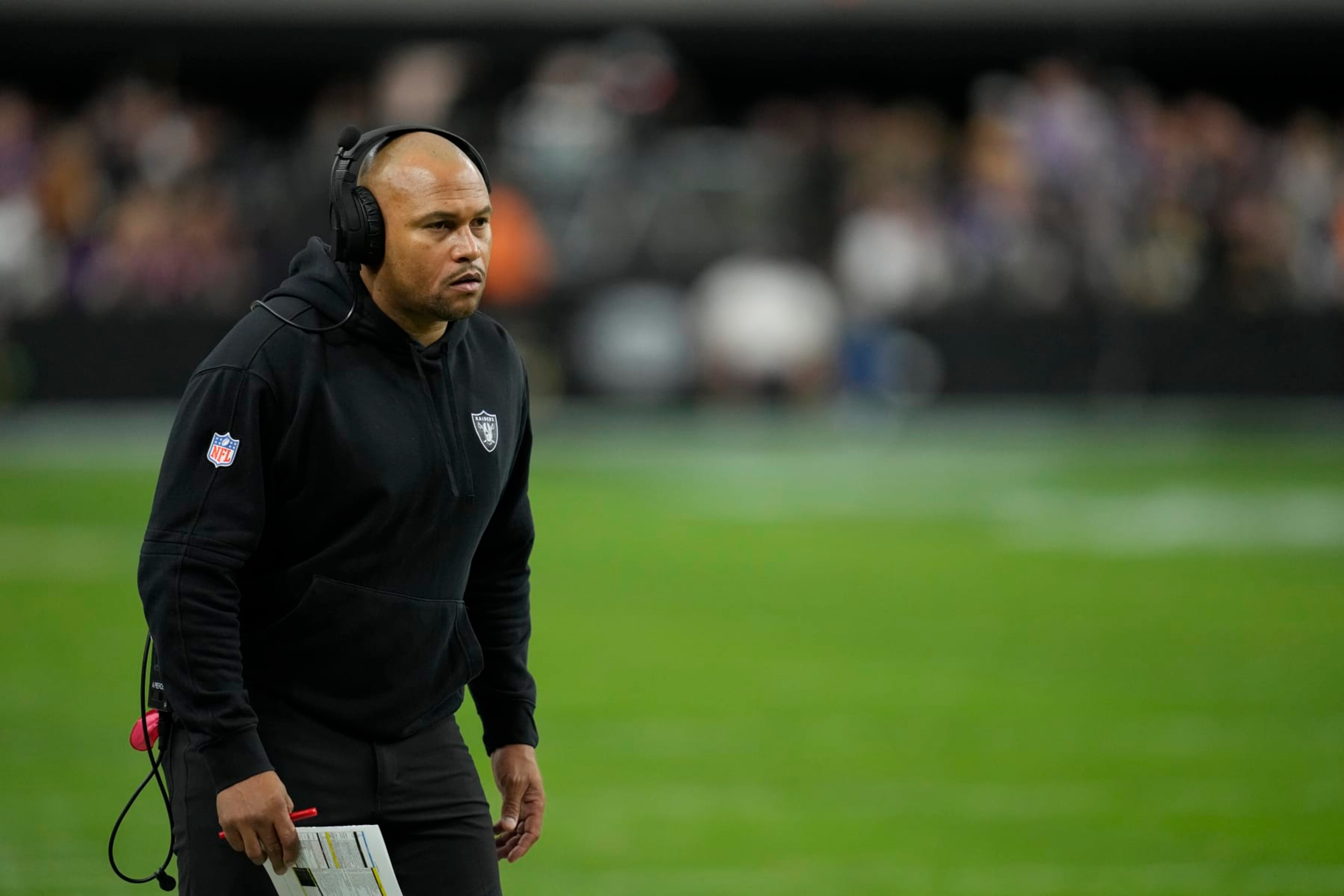 Las Vegas Raiders interim head coach Antonio Pierce watches against the Minnesota Vikings during an NFL football game, Sunday, Dec. 10, 2023, in Las Vegas. (AP Photo/John Locher) Las Vegas Raiders interim head coach Antonio Pierce watches against the Minnesota Vikings during an NFL football game, Sunday, Dec. 10, 2023, in Las Vegas. (AP Photo/John Locher)